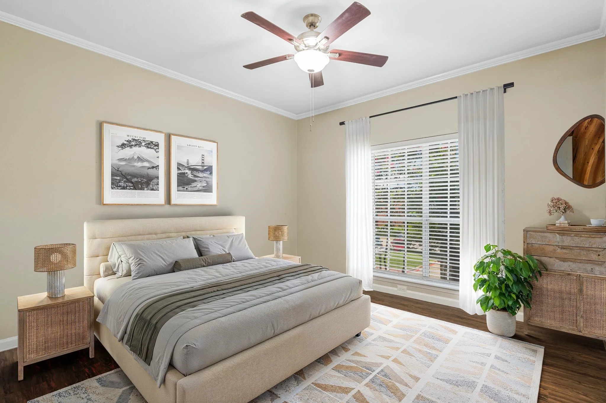 Bedroom featuring crown molding, dark wood-style flooring, and ceiling fan