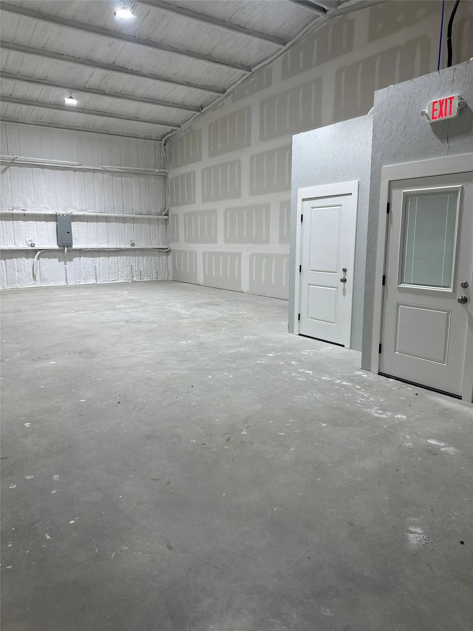 Warehouse showing entry to office/bathroom