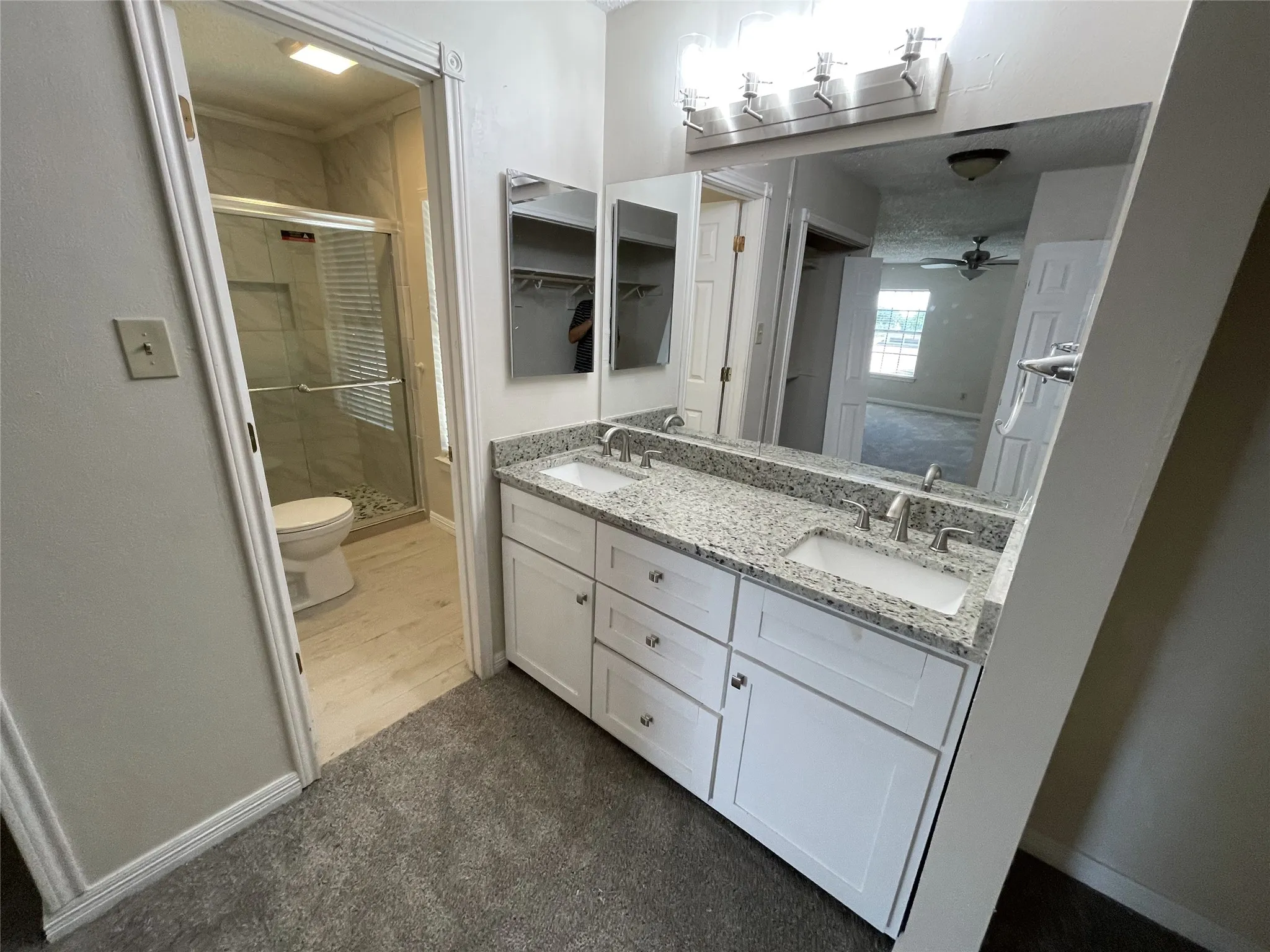 Double vanity with granite countertop and undermount sinks
