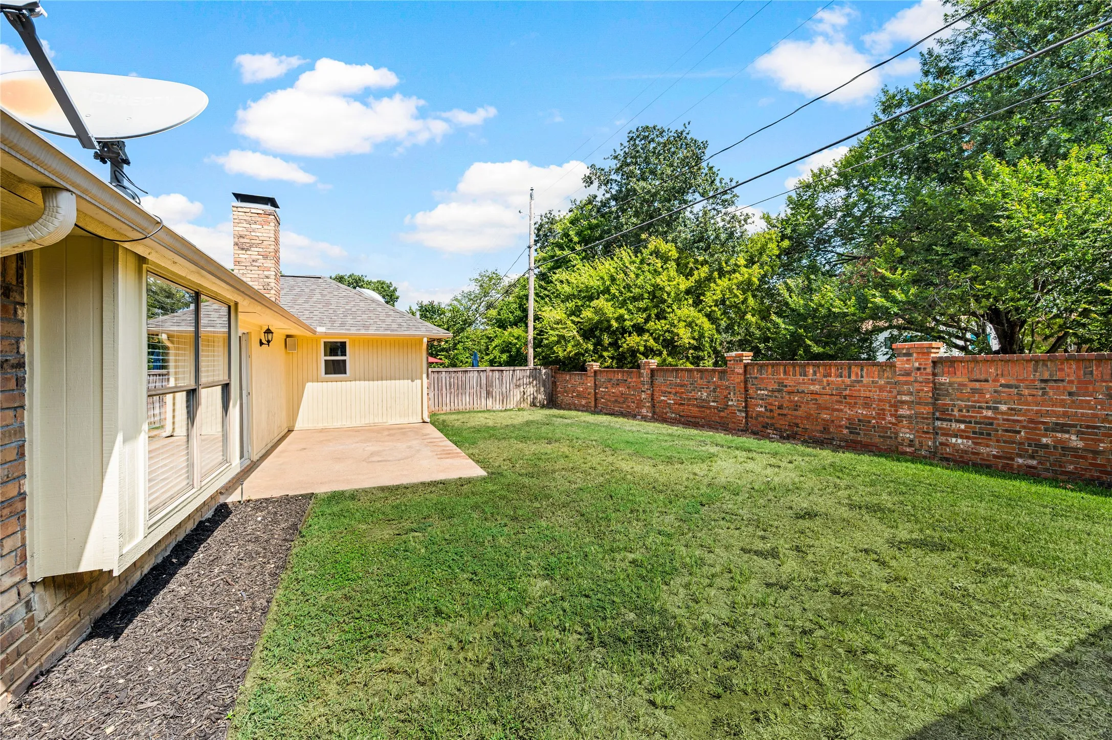Yard photos have been digitally enhanced to depict green grass.