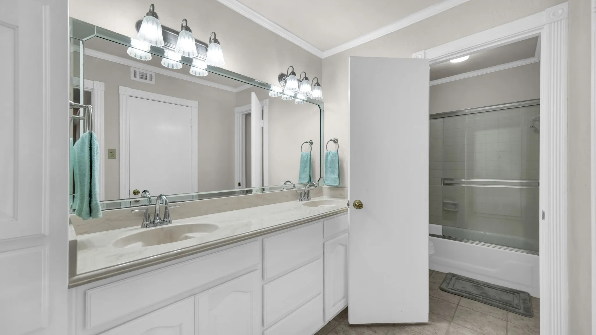 See next photo for updated photo of tub/shower