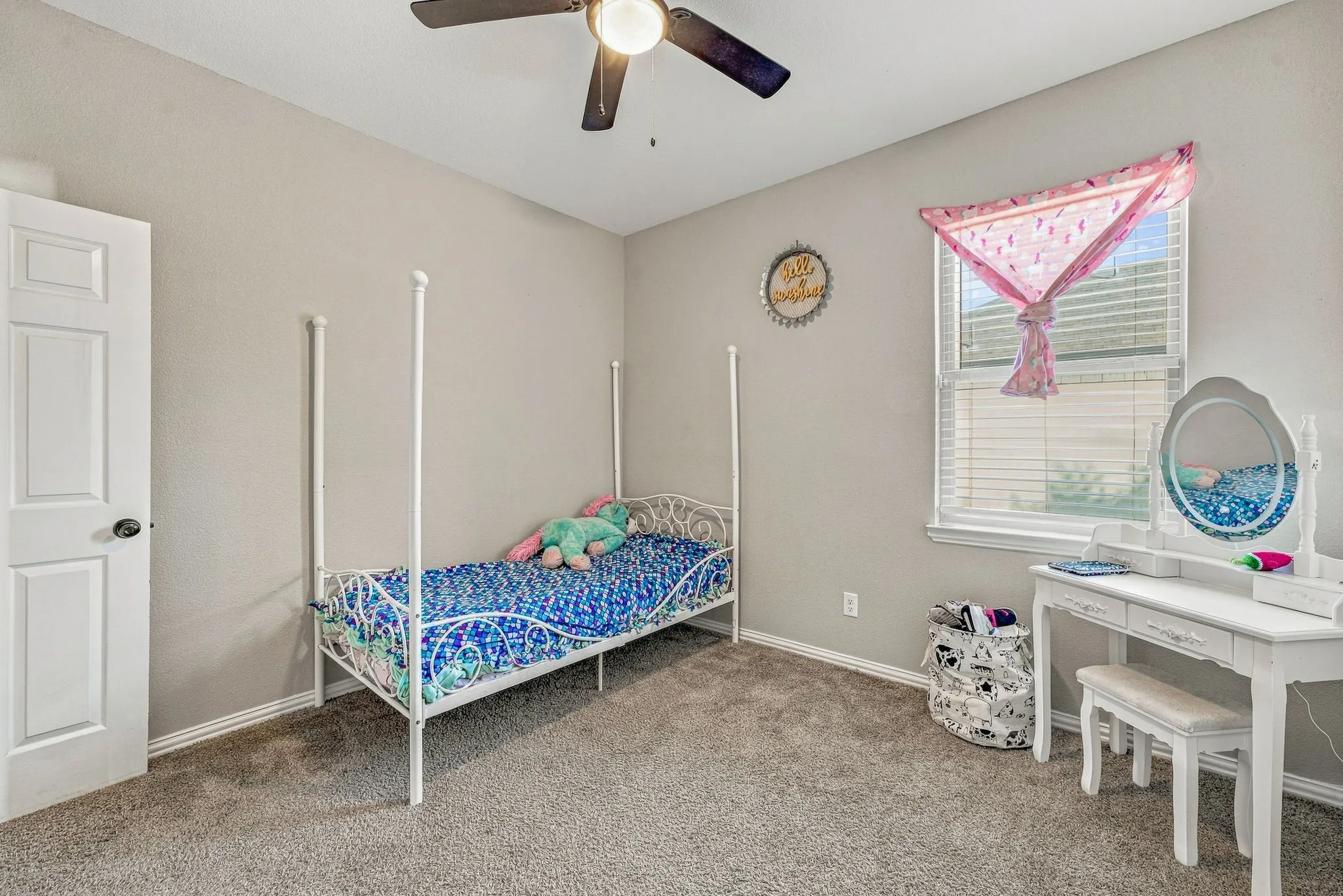 Gray carpeting and neutral wall tones