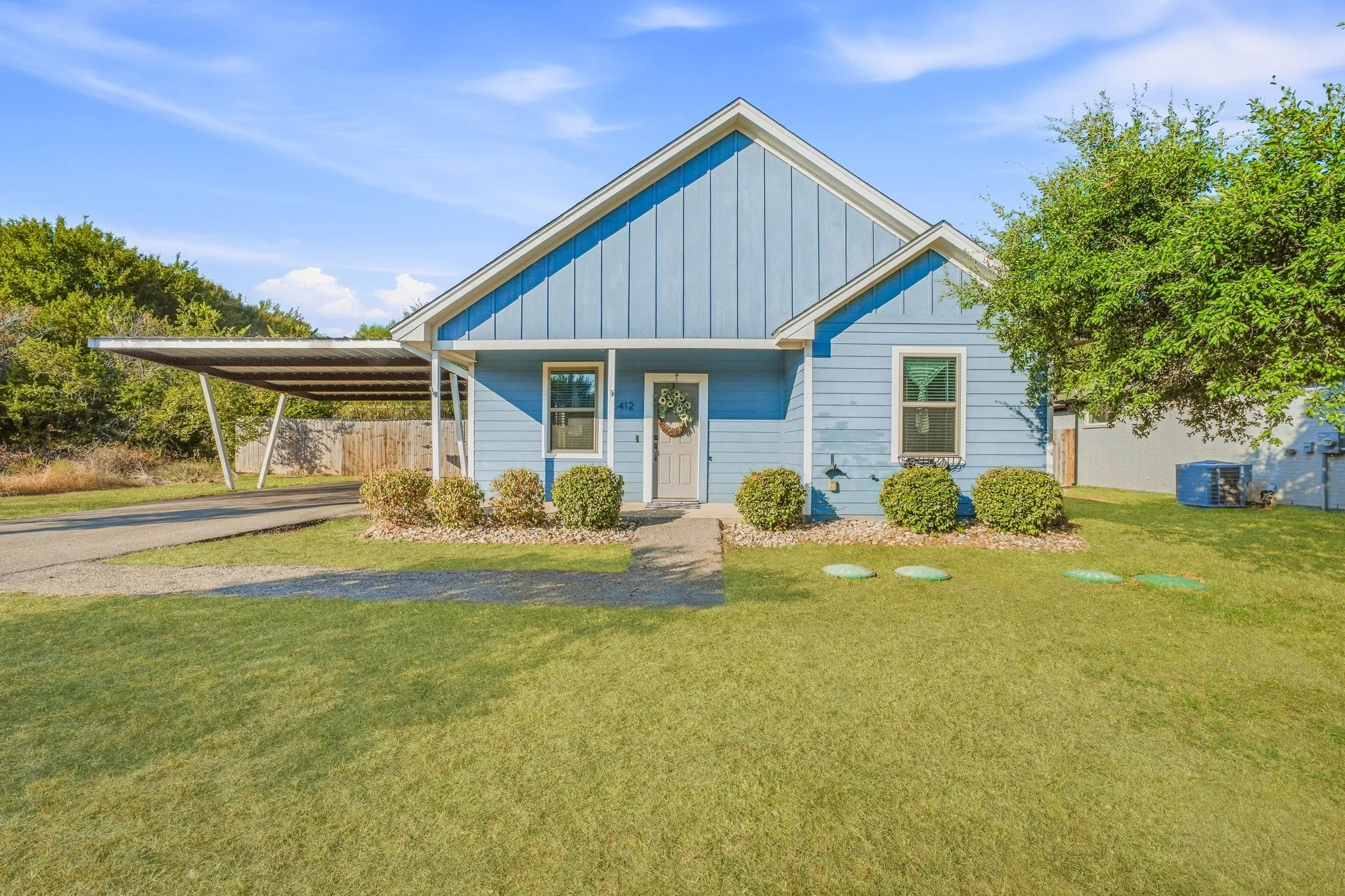 Light blue exterior with vertical and horizontal siding