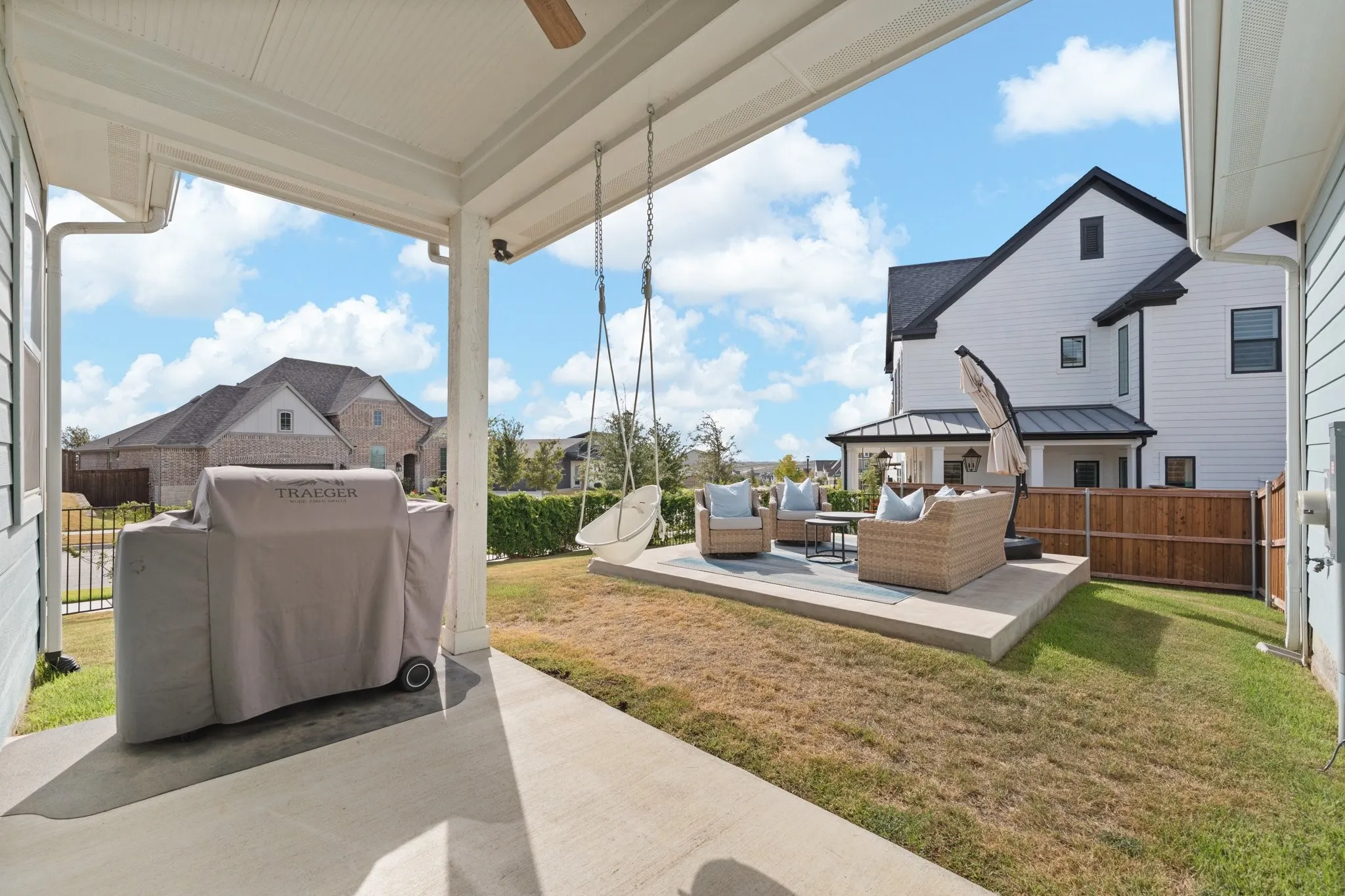 back yard with 2 different patios