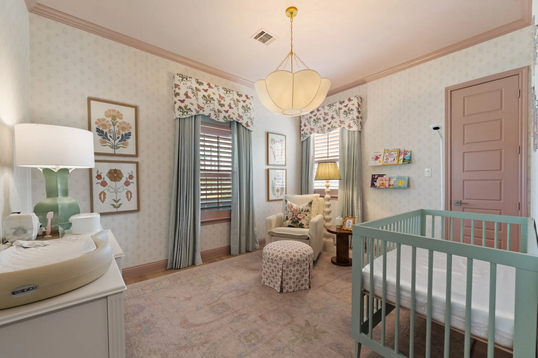 secondary bedroom with plantation shutters, designer wallpaper and fixtures
