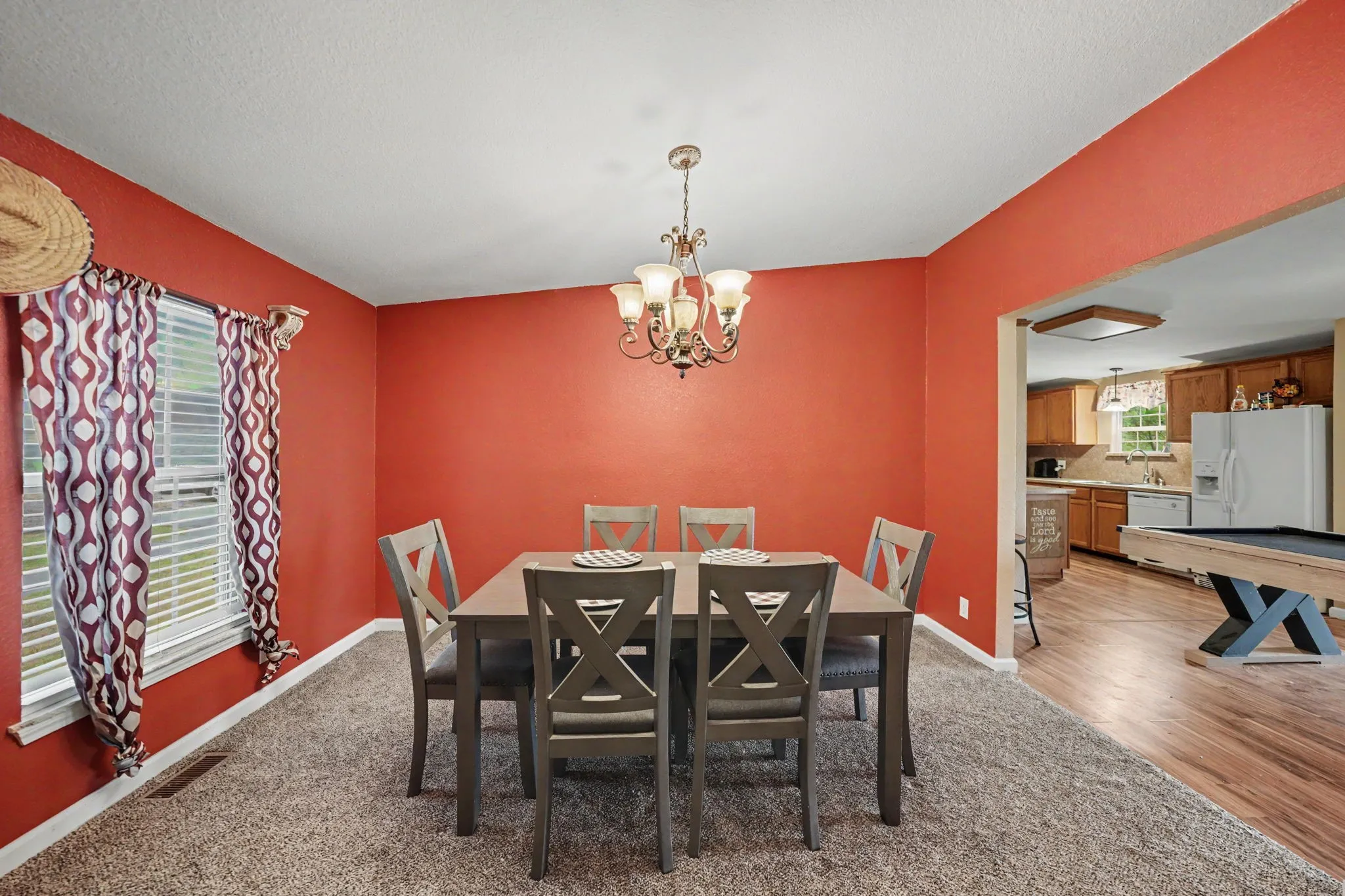 Spacious dining area with room for a large table, conveniently located off the kitchen.
