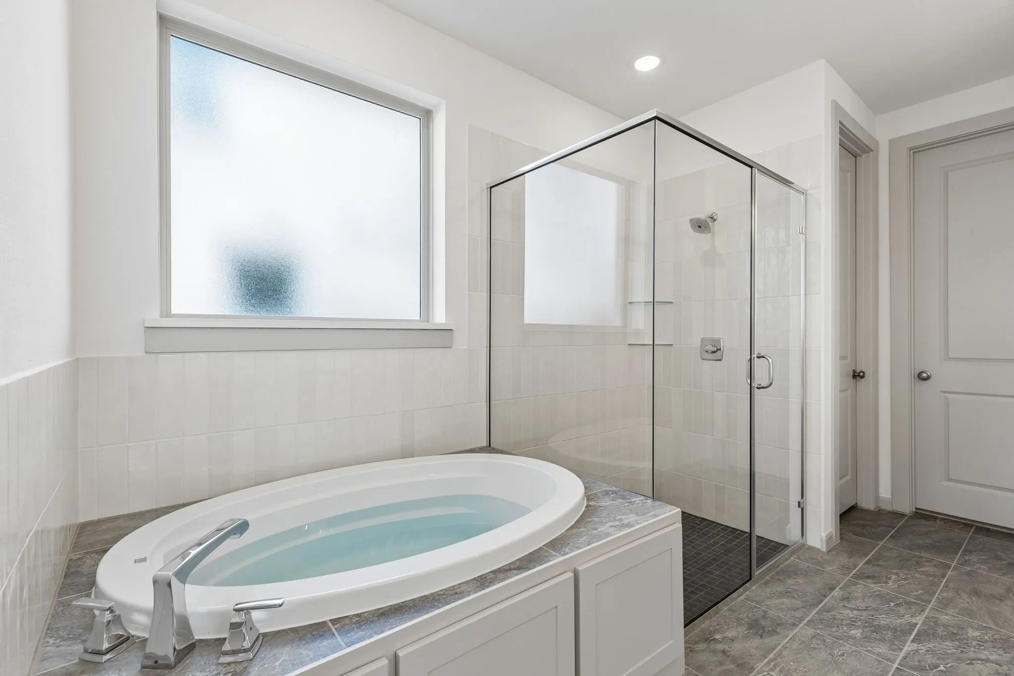 Your new owner's bath comes complete with a relaxing garden tub and oversized, walk in shower.