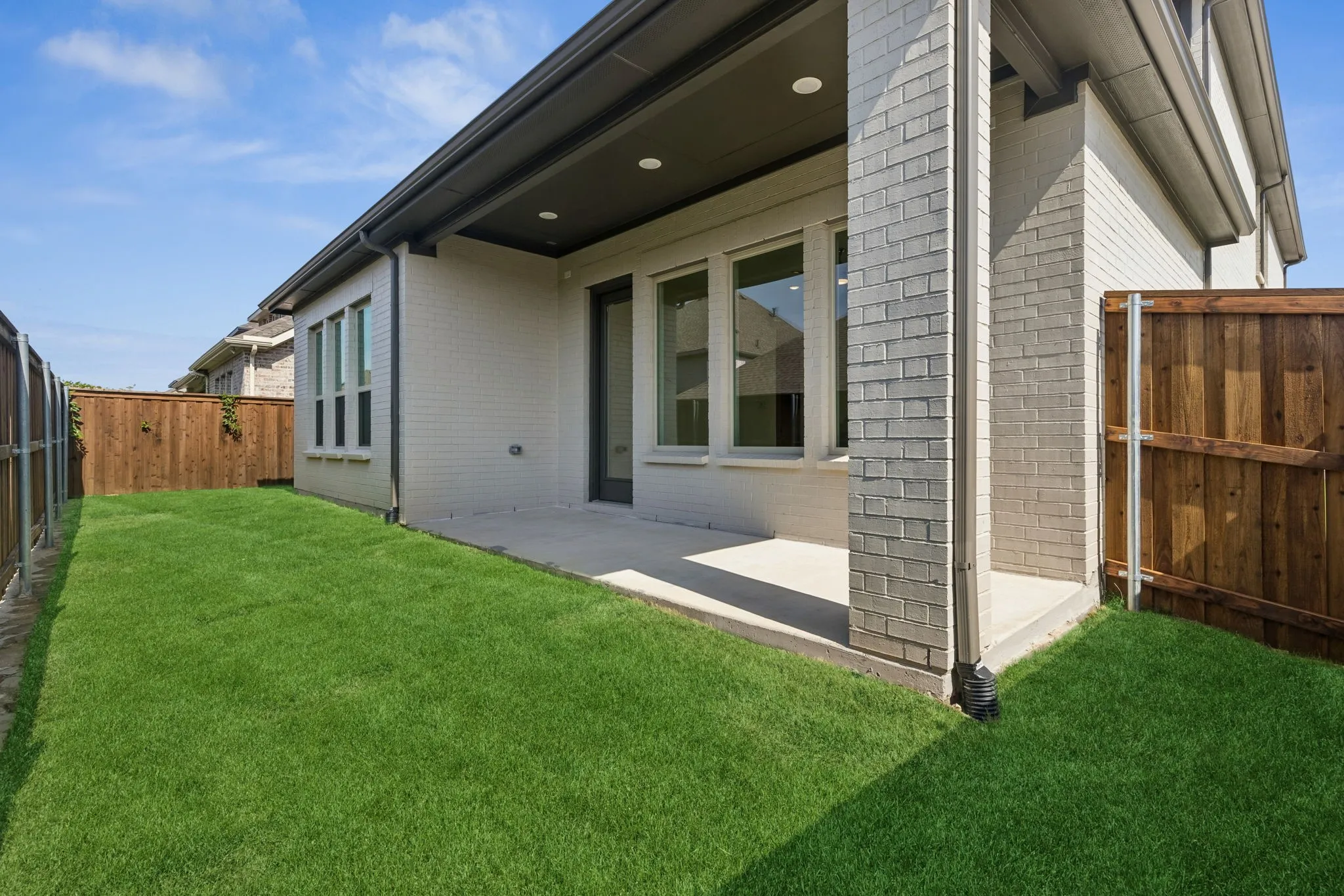 Not too big and not too small, this fenced back yard with covered patio offers the perfect outdoor space for the family to enjoy.