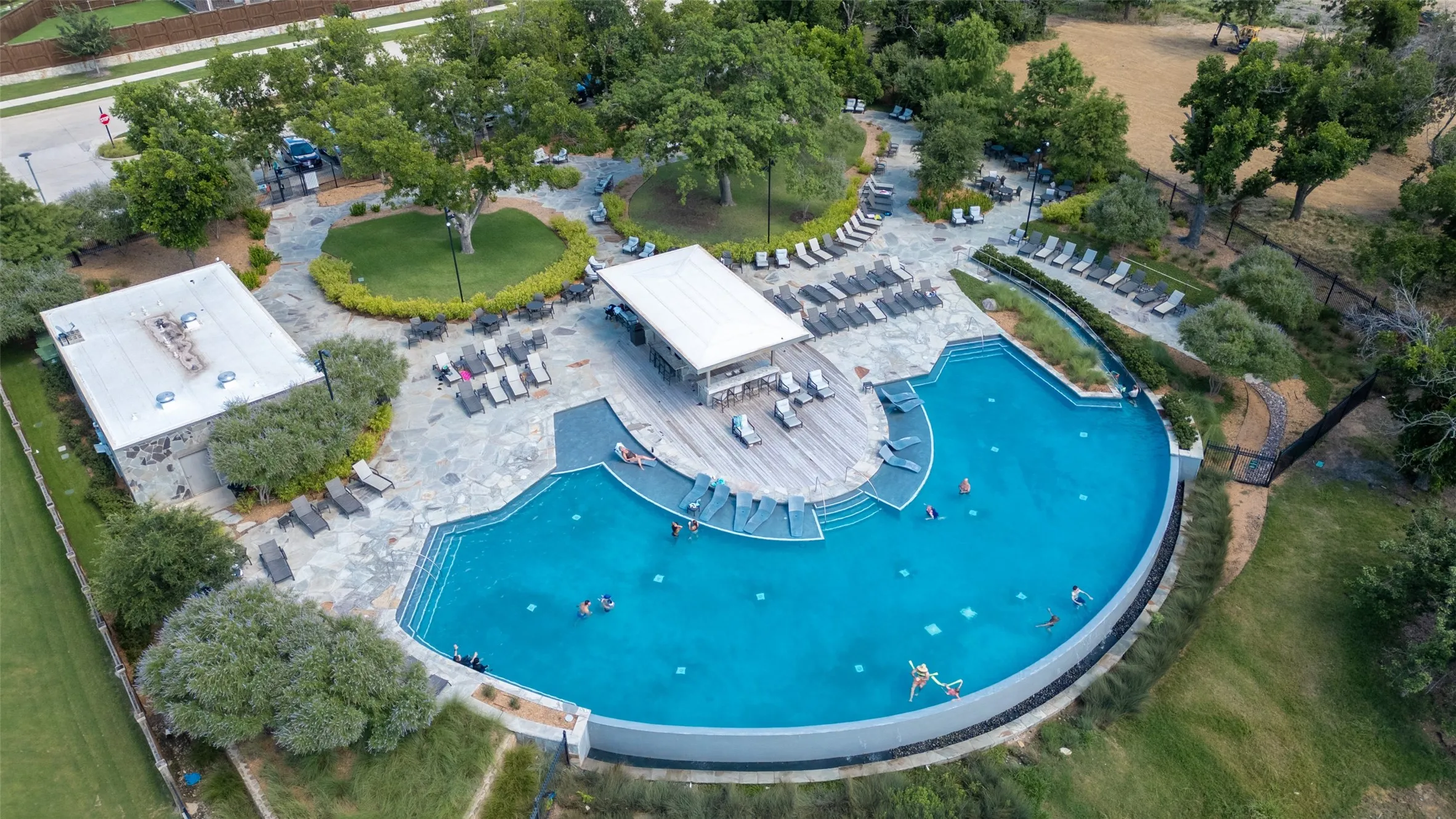 Resort-style living awaits at The Tribute's spectacular lakeside infinity-edge pool. Relax on the tanning ledge, gather with friends at the outdoor grilling station and kitchen, or soak in the stunning surroundings while enjoying one of the community's premier amenities just moments from home.
...