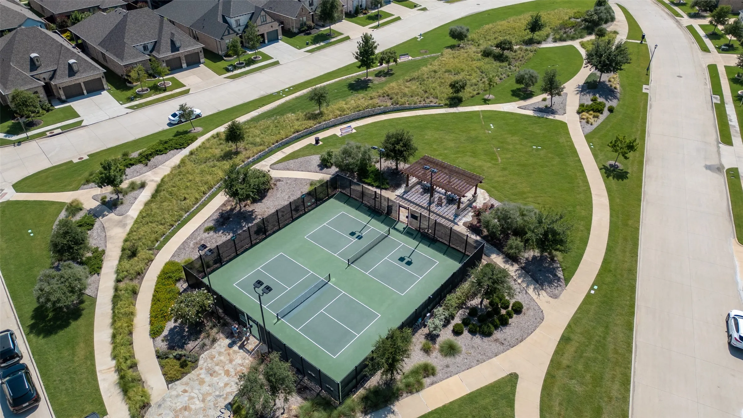 Stay active just steps from home at The Tribute's beautifully maintained neighborhood pickleball courts. Surrounded by scenic walking trails and green space, this popular amenity offers the perfect place for friendly competition, exercise, and connecting with neighbors in a vibrant, resort-style community.
...