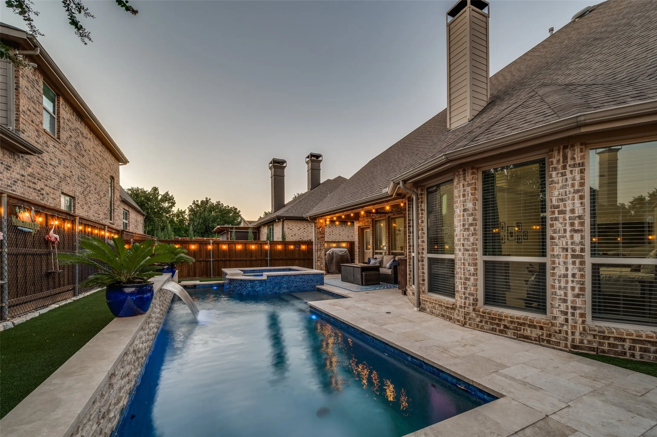 Thoughtfully designed for year-round entertaining, this incredible outdoor retreat offers the perfect setting to relax, unwind, and enjoy Texas evenings.