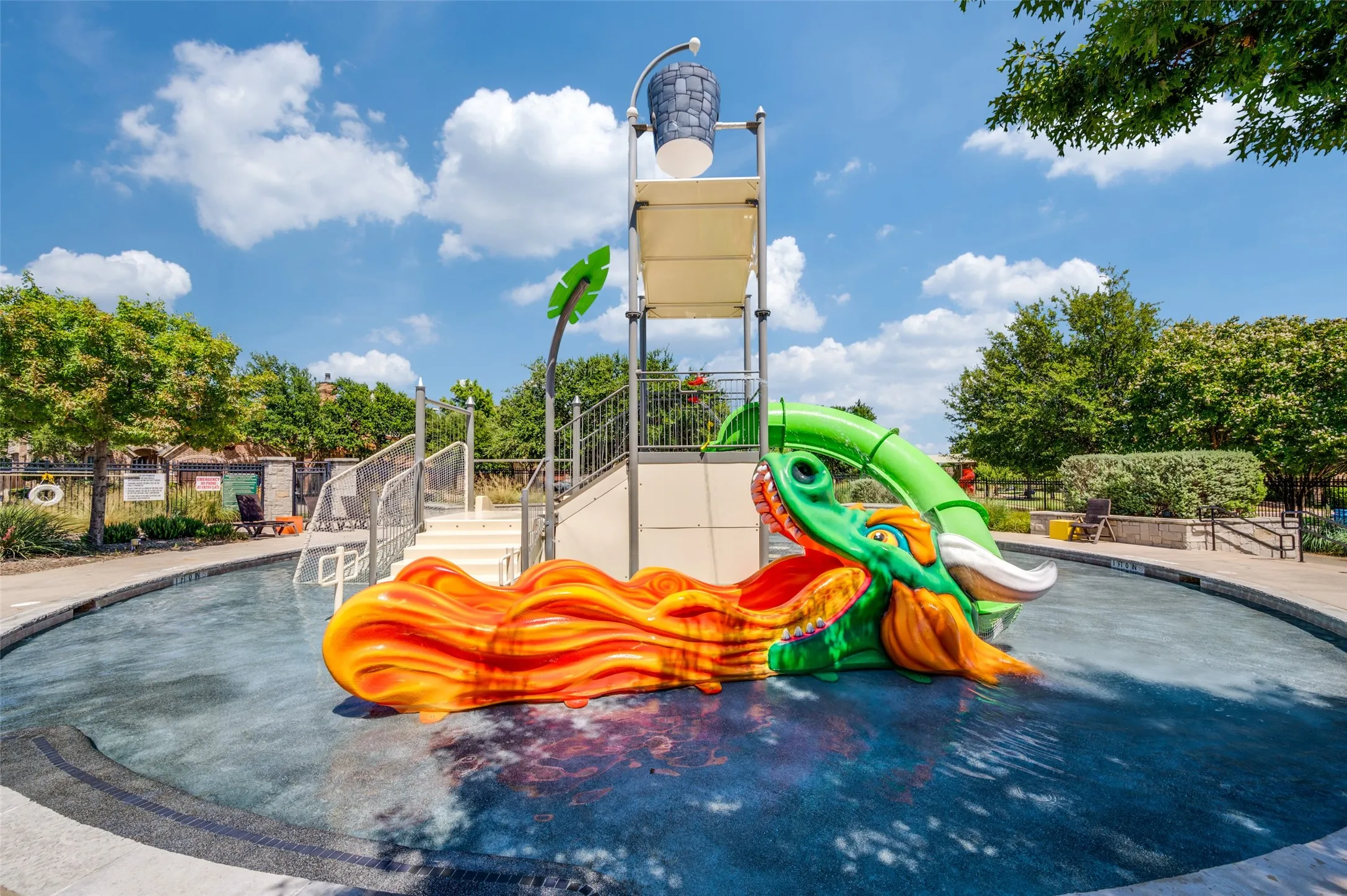 The neighborhood splash park provides endless fun for kids with interactive water features, playful fountains, and colorful spray elements. It's the perfect place to cool off, make memories, and enjoy the resort-style amenities that make life in The Tribute so special. ...