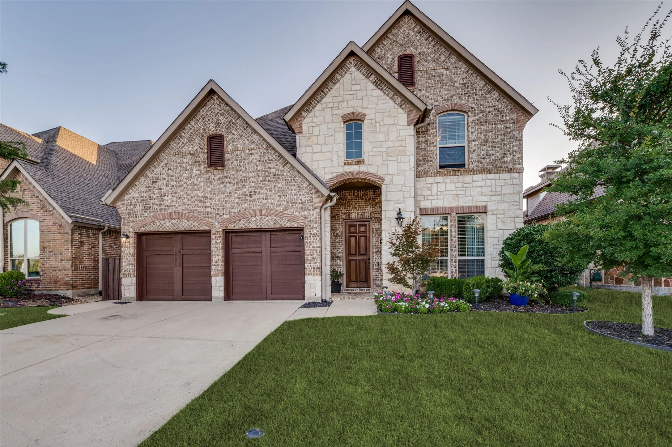 Located in the highly sought-after community of The Tribute, this beautifully maintained 4-bedroom, 3.5-bath home offers timeless curb appeal, a spacious floor plan, and stylish finishes throughout.