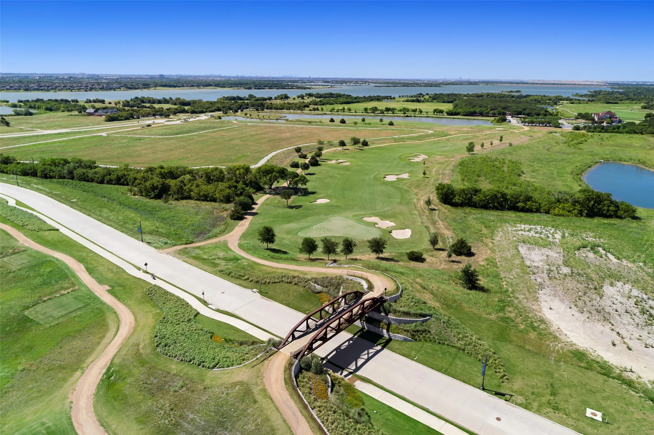 Experience championship golf at The Tribute, home to two award-winning courses set against the breathtaking backdrop of Lake Lewisville. Residents also enjoy a beautiful clubhouse featuring a full-service restaurant, live music, social events, and year-round entertainment, creating a true resort-style lifestyle both on and off the course.
...