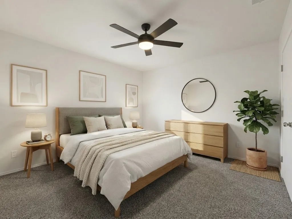 White walls with textured gray carpet