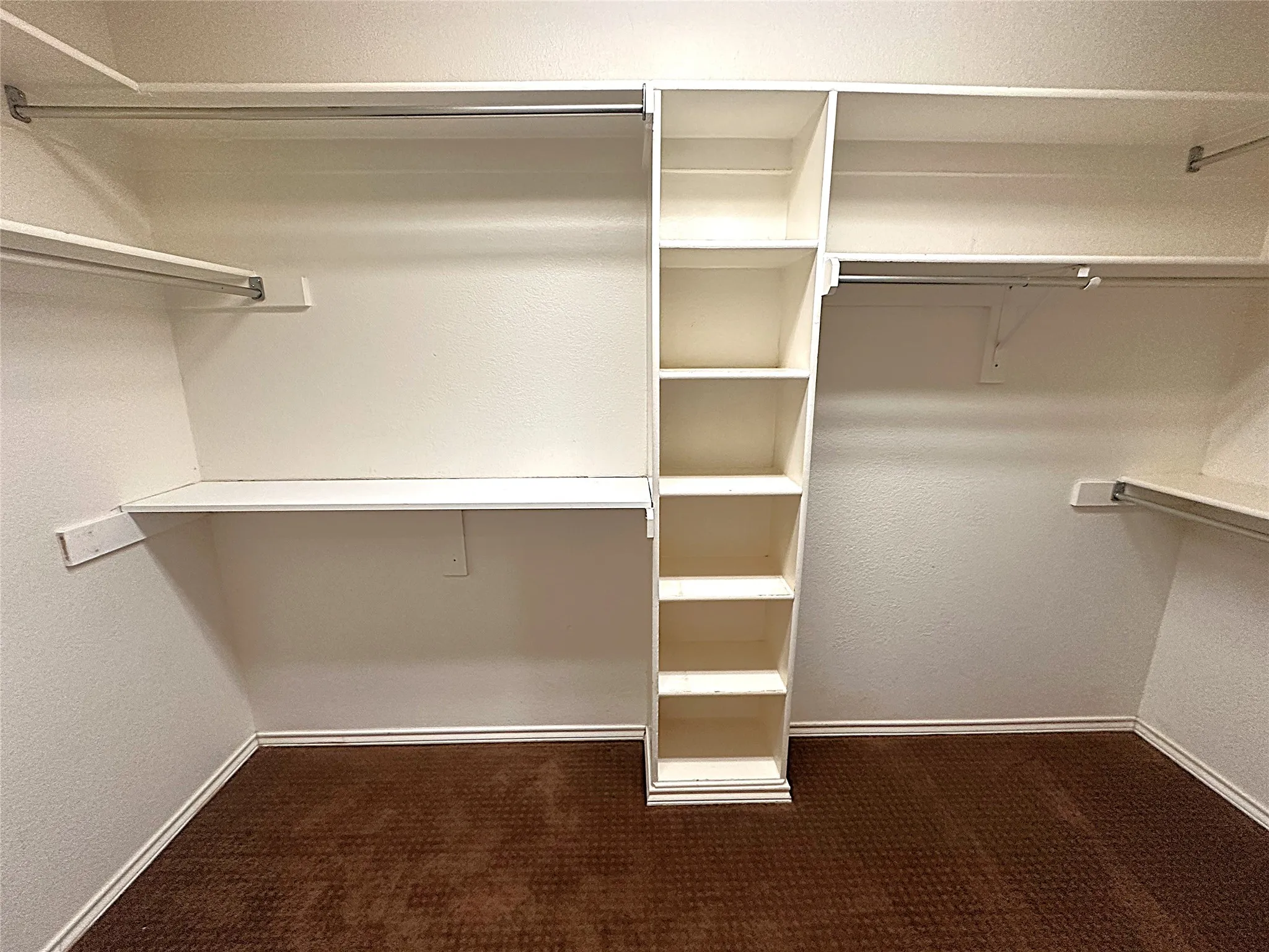 Built-in shelving with multiple compartments