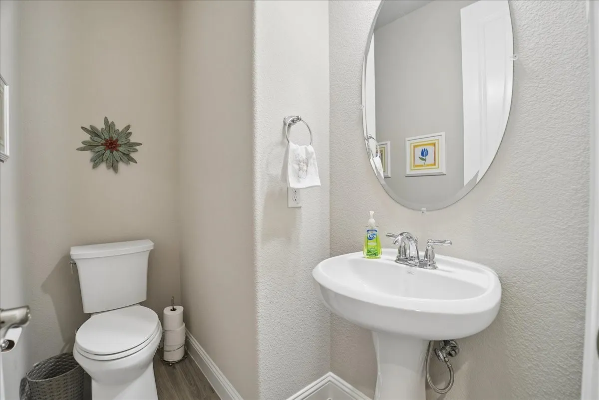 Convenient first-floor half bath, perfect for guests.