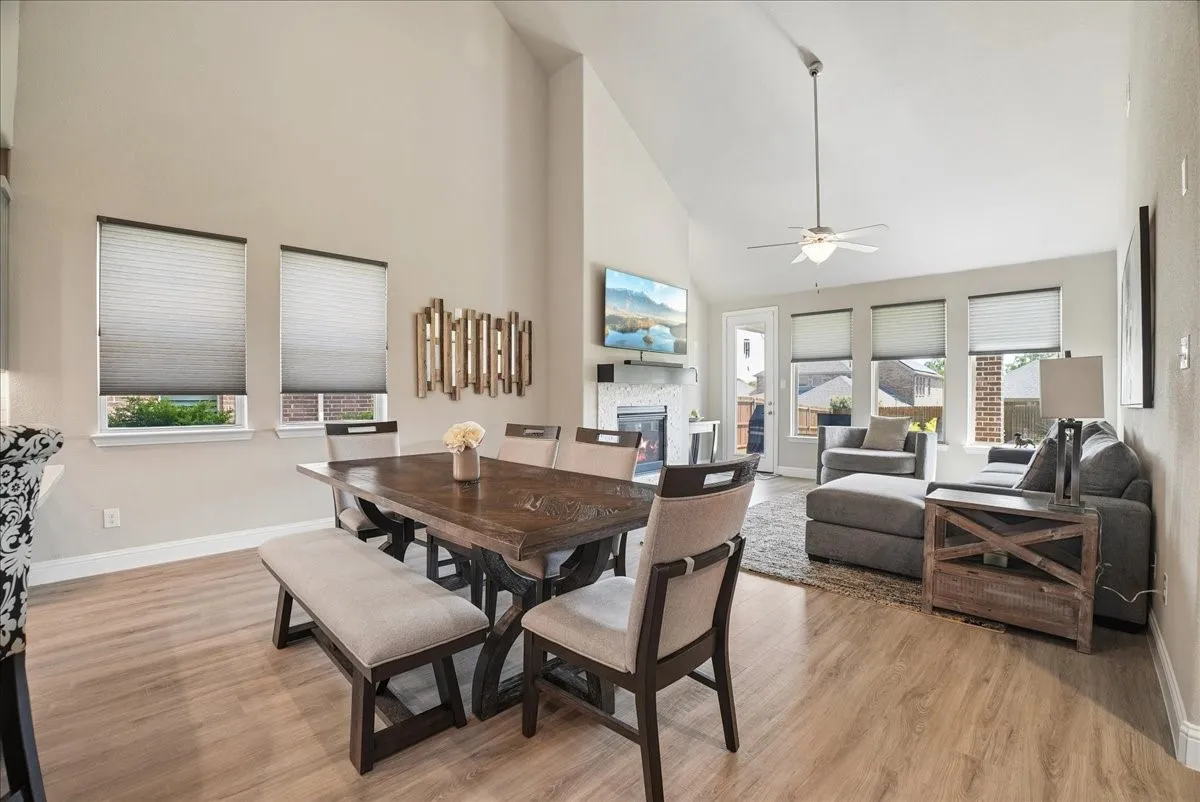 Spacious dining area flows seamlessly into the bright , open living room.