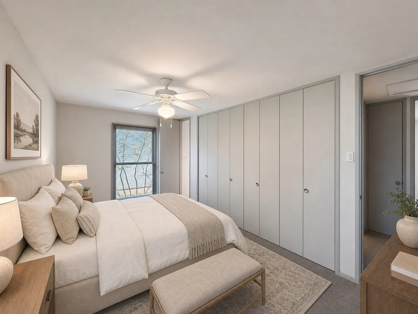 Recessed lighting, ceiling fan, expansive built-in cabinetry, and neutral wall tones