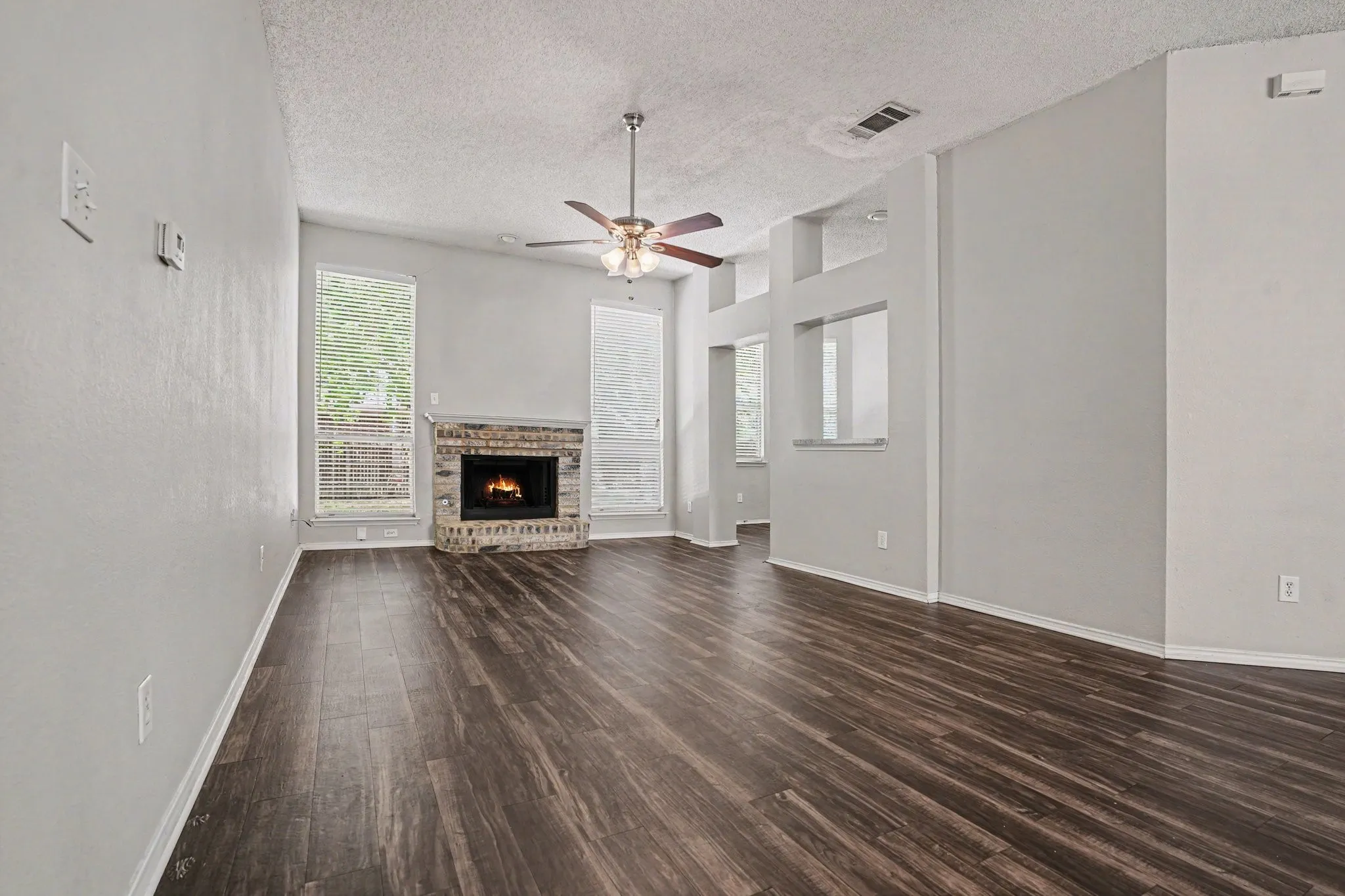 View from the front door into the living room. Open floorplan.