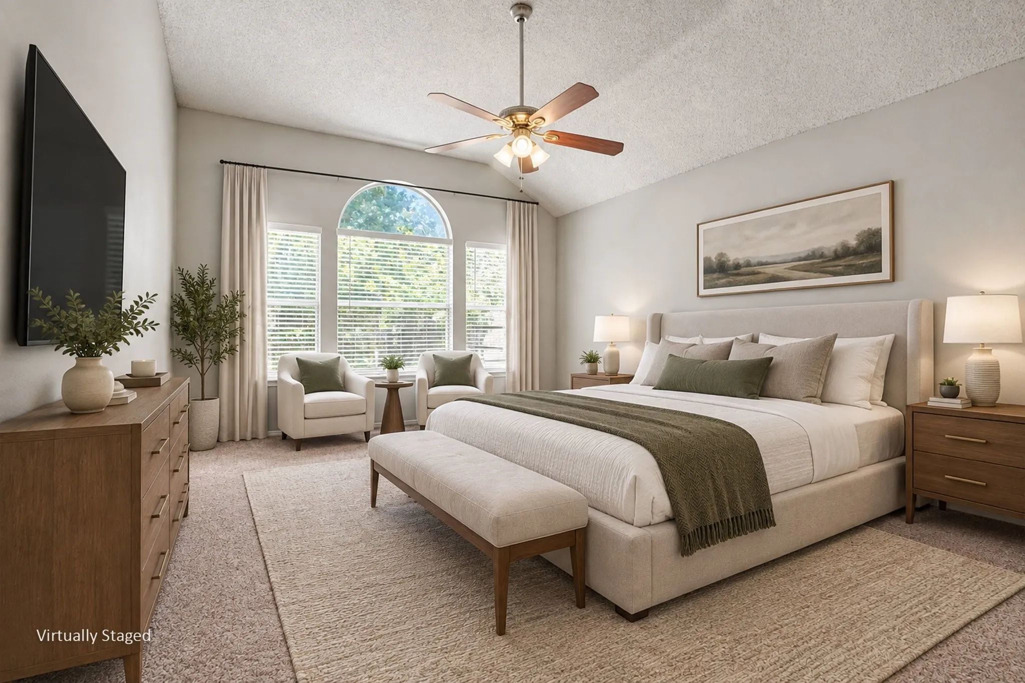 Virtually staged primary bedroom. Split floorplan for privacy.