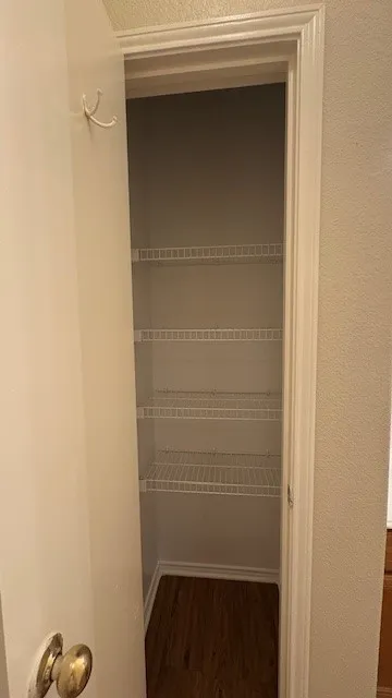 Primary Bathroom has linen closet for extra storage.