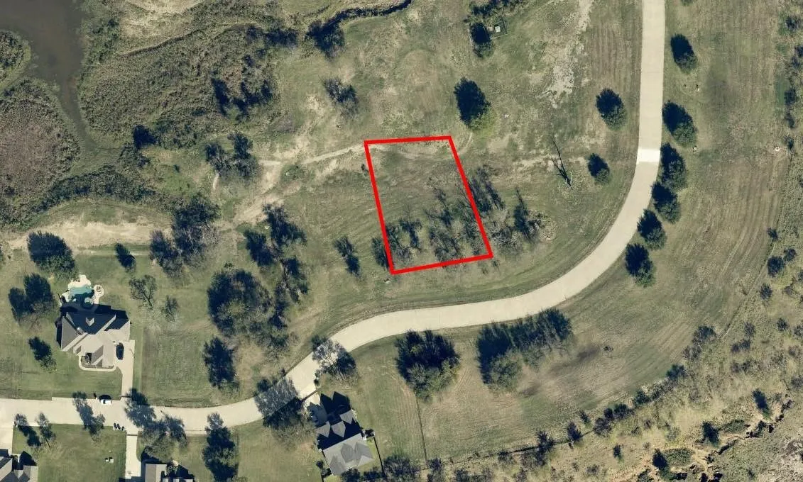 Aerial Property Map. An overhead view of the property, with its boundaries outlined in red