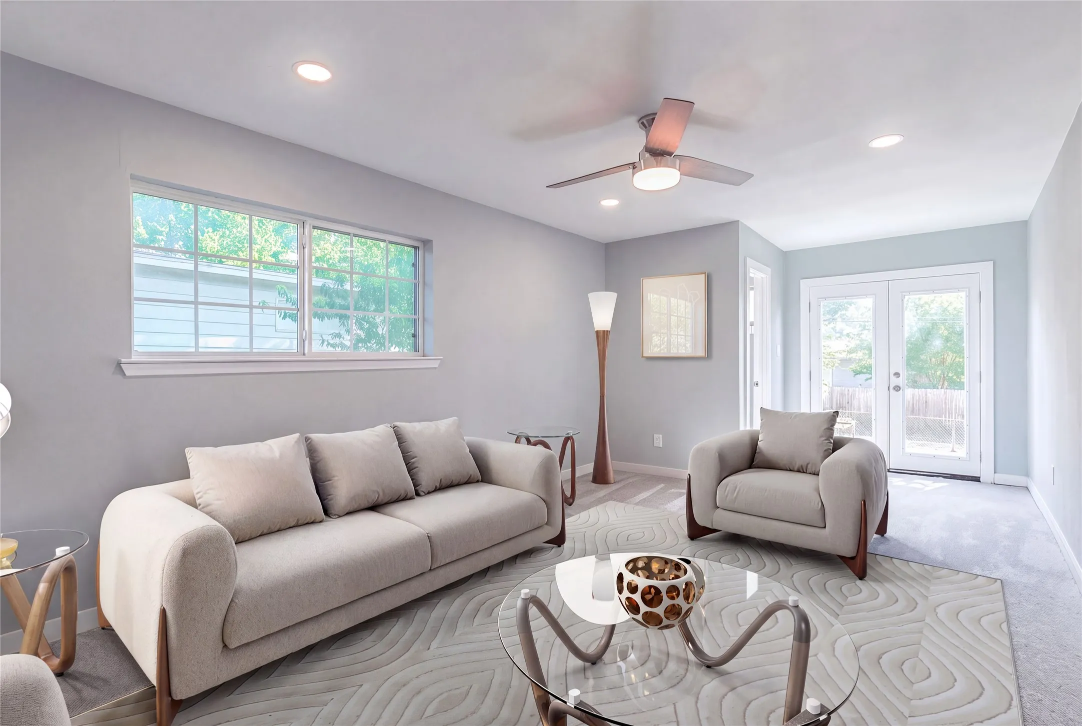 Recessed lighting, ceiling fan, and French doors