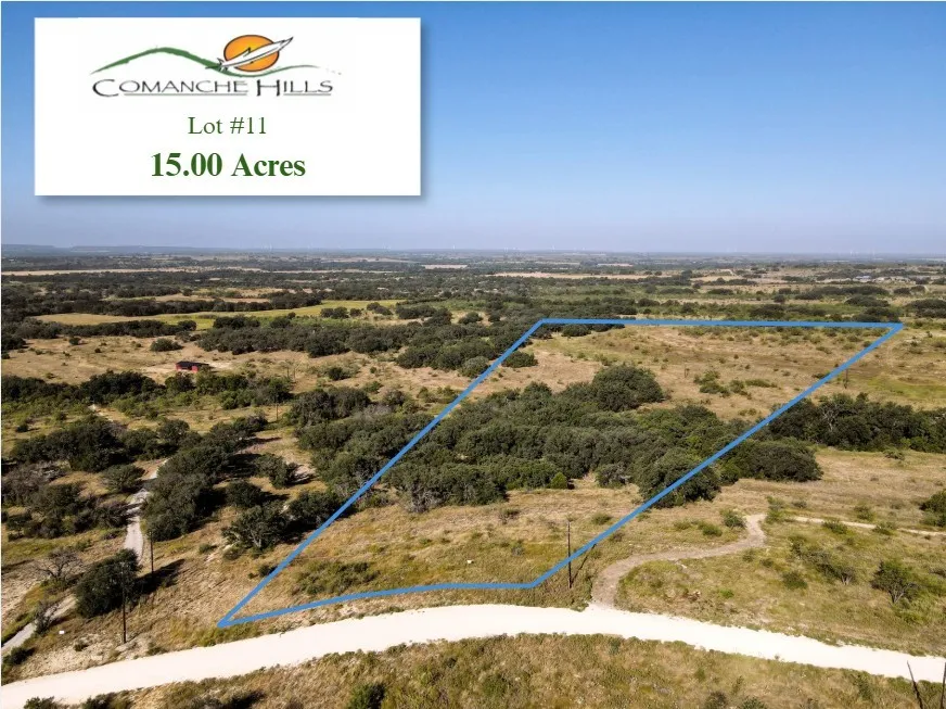 Expansive 15.00-acre lot featuring varied terrain and mature trees