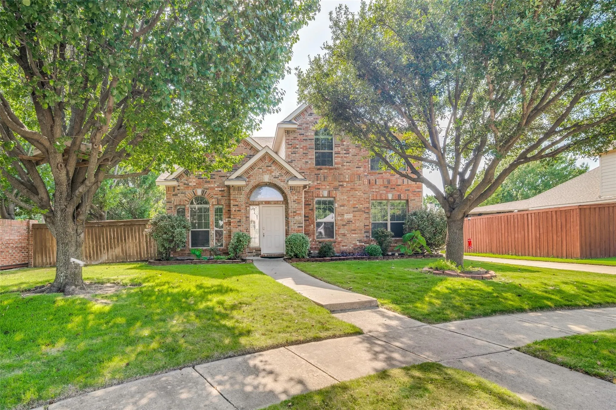 Brick exterior with arched entry