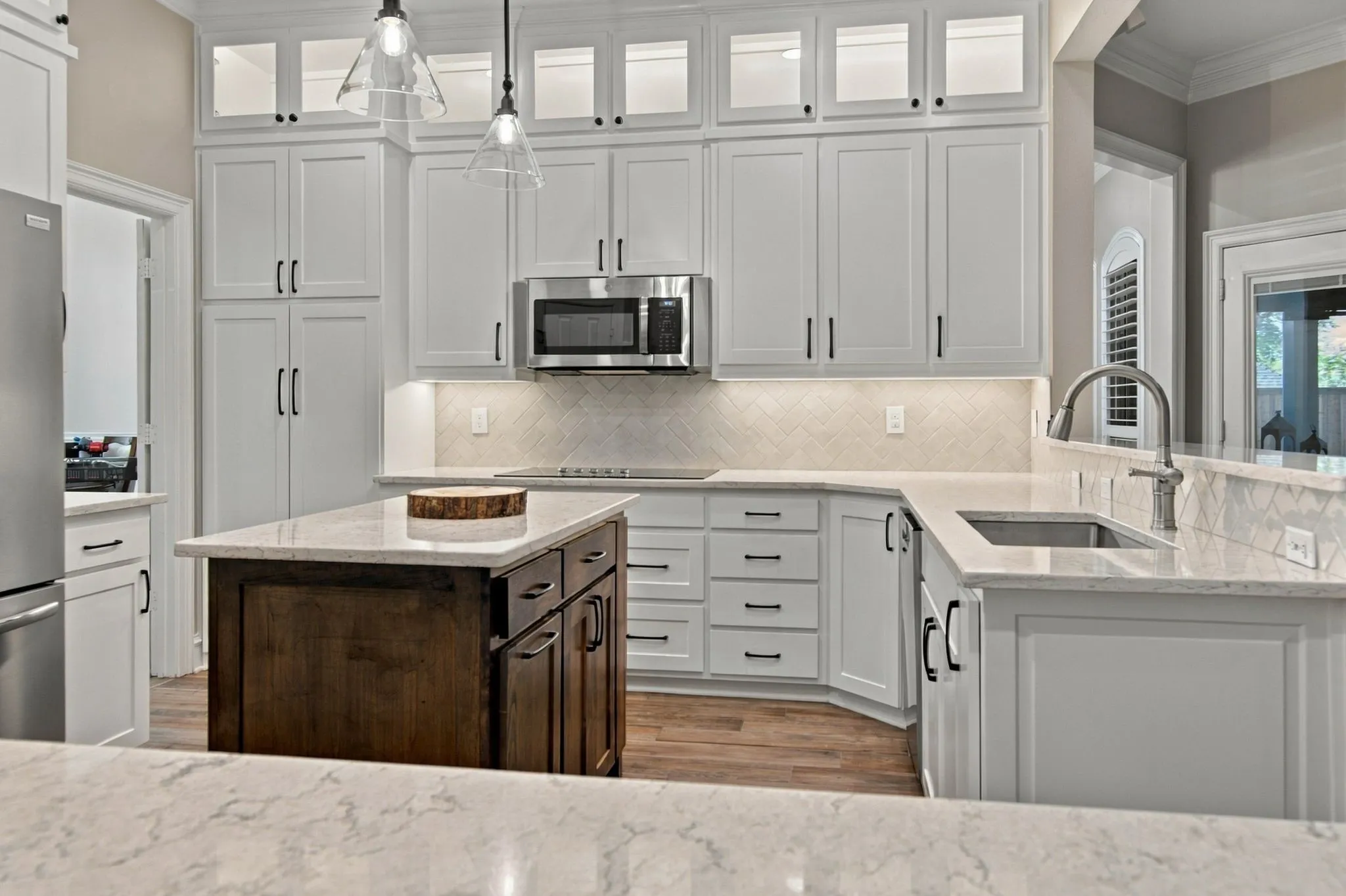 Designer cabinets, lighting, and generous storage.