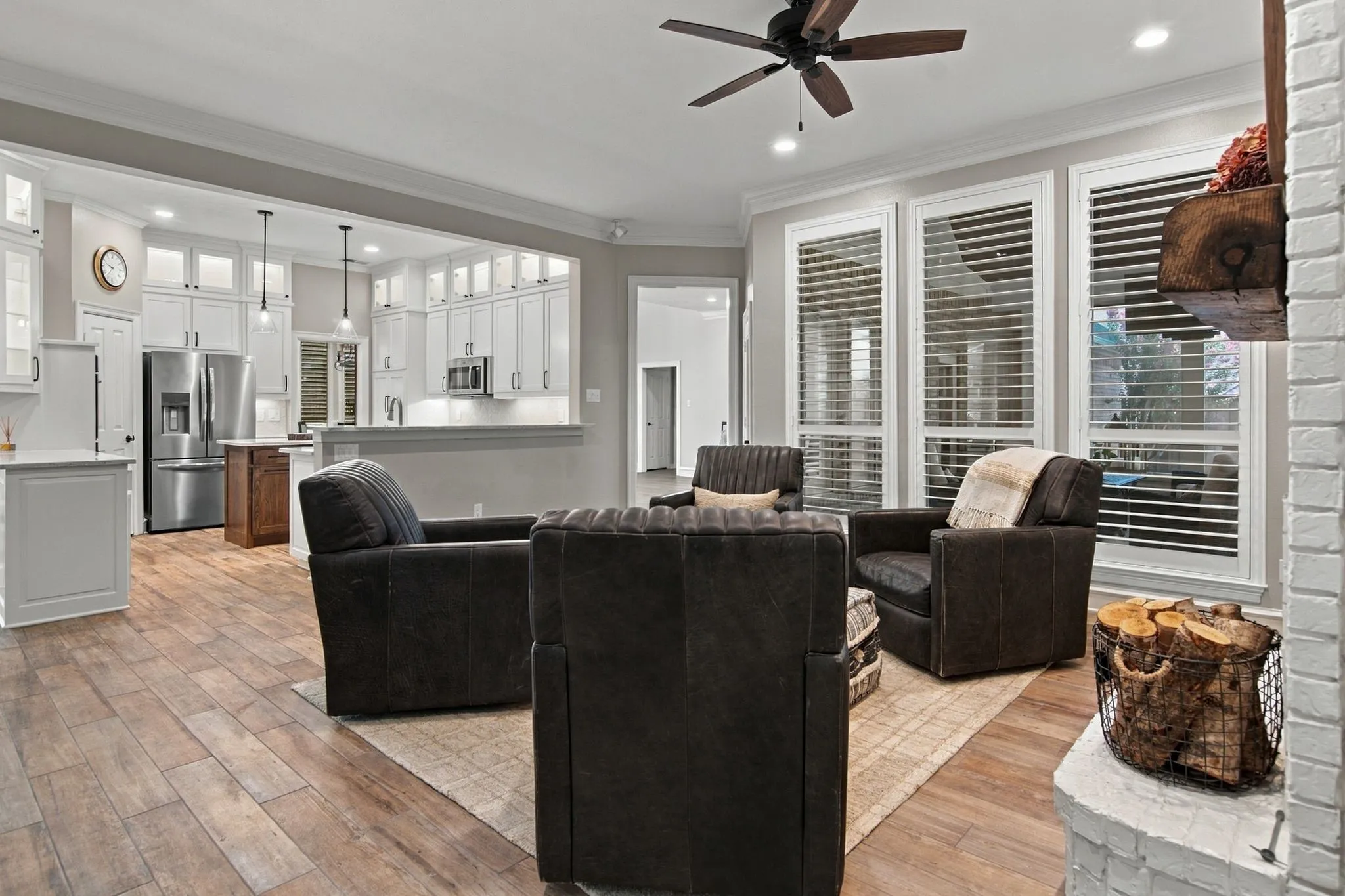Open to the kitchen, the family room is warm and inviting and features a Bose Surround Sound system.