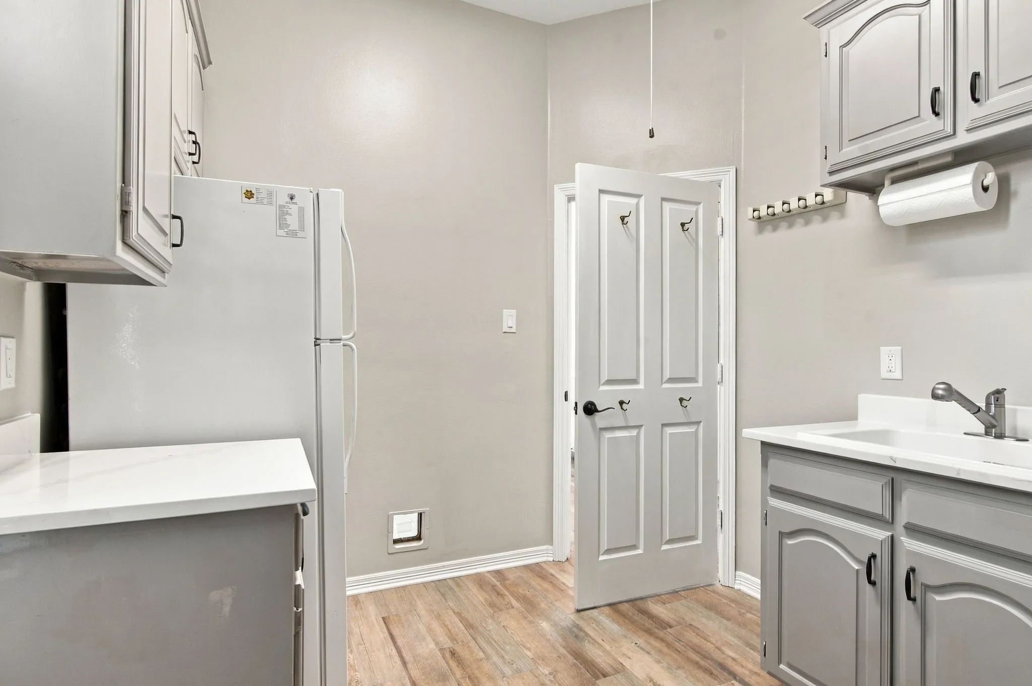 Built-in sink with quartz counter.  Even a laundry chute from upstairs!