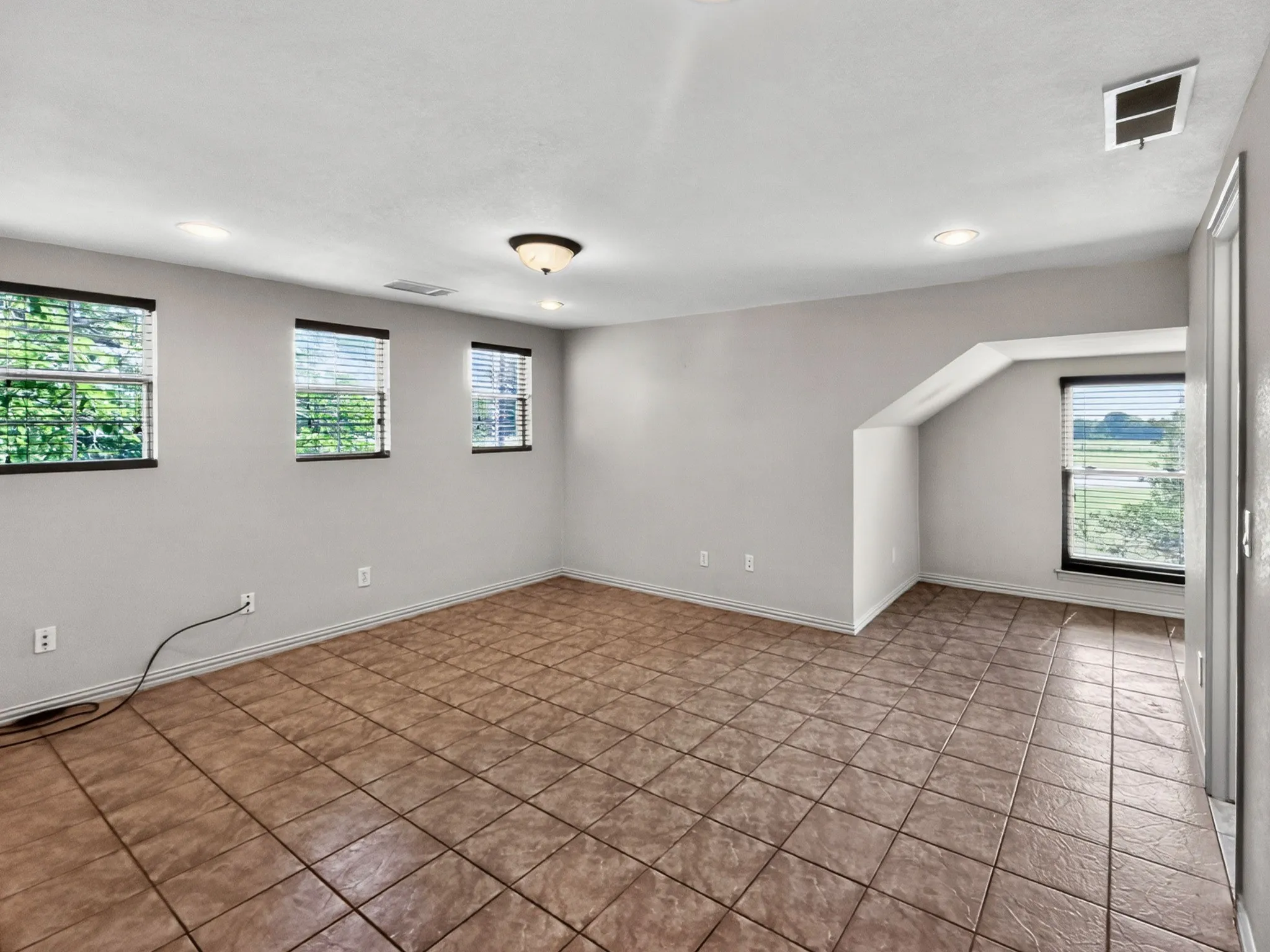 Upstairs den or bedroom with walk in closet