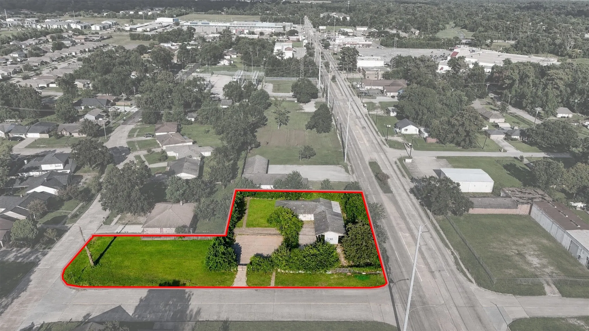 This photo includes the lot also for sale on Rinn Rd. to showcase the potential of the property