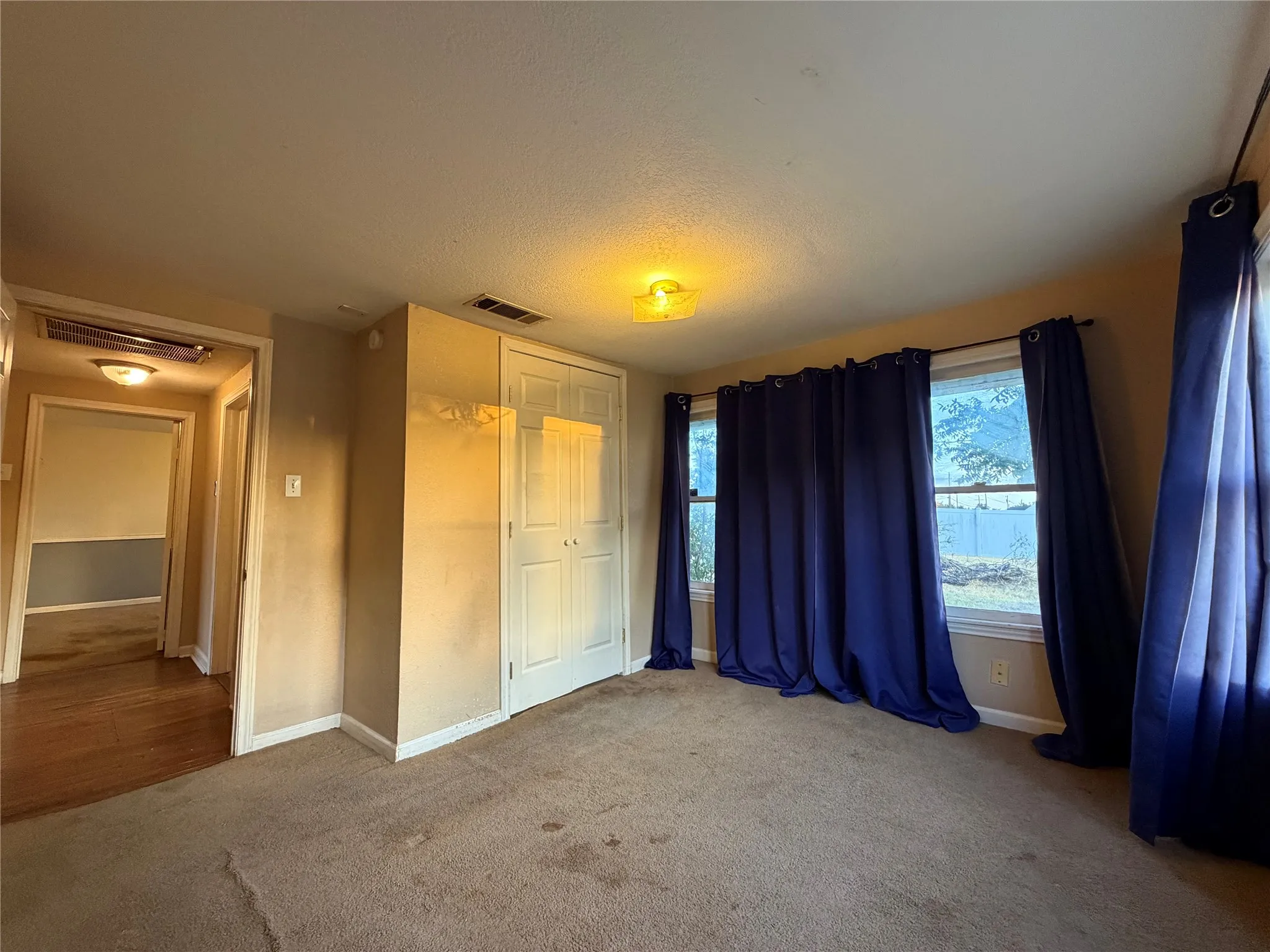 In back of house for extra privacy