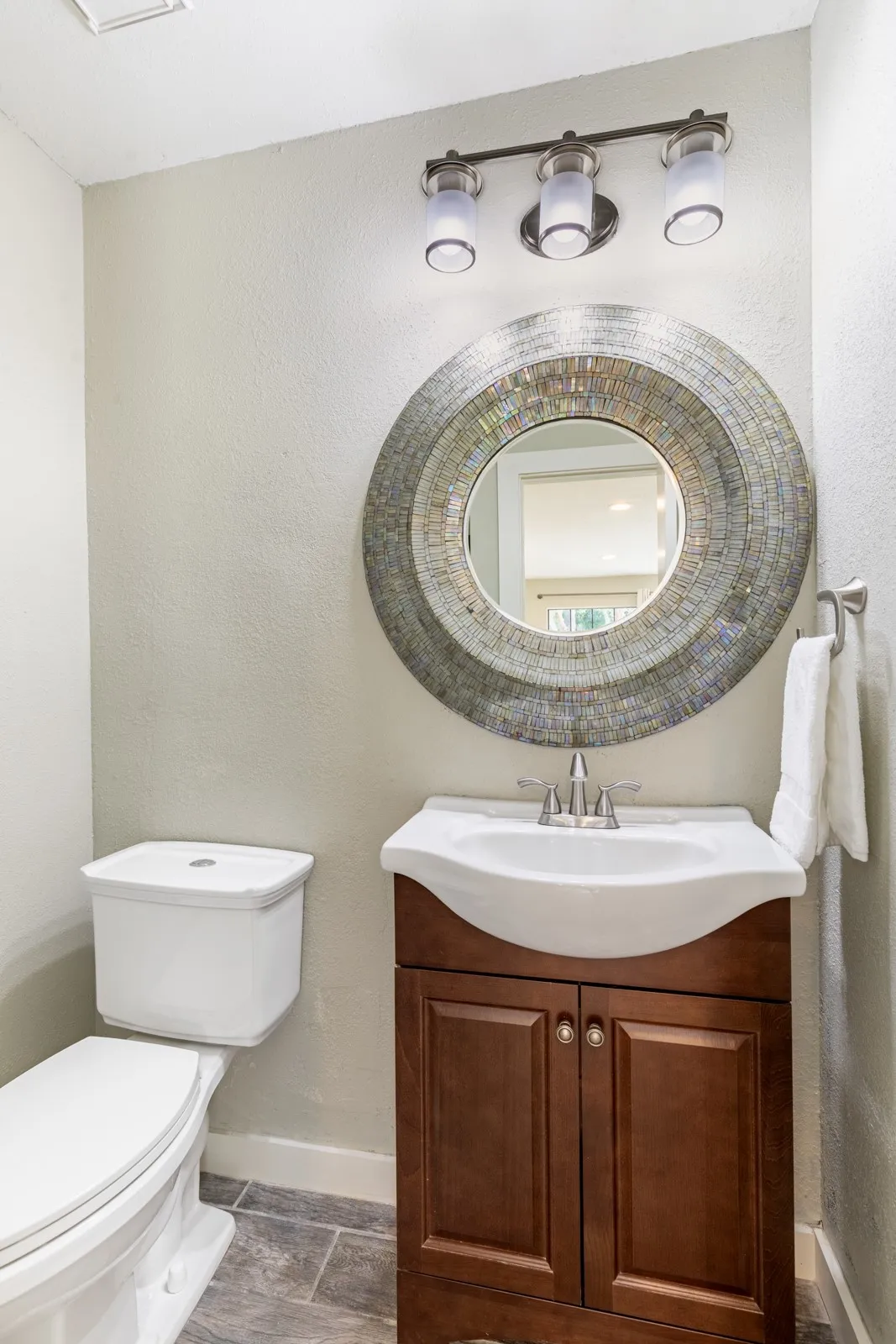 Half bath located off family room.