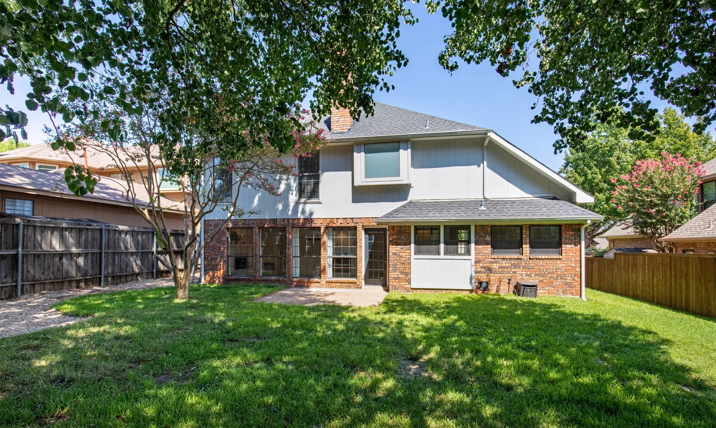Backyard with plenty of room for family activities.