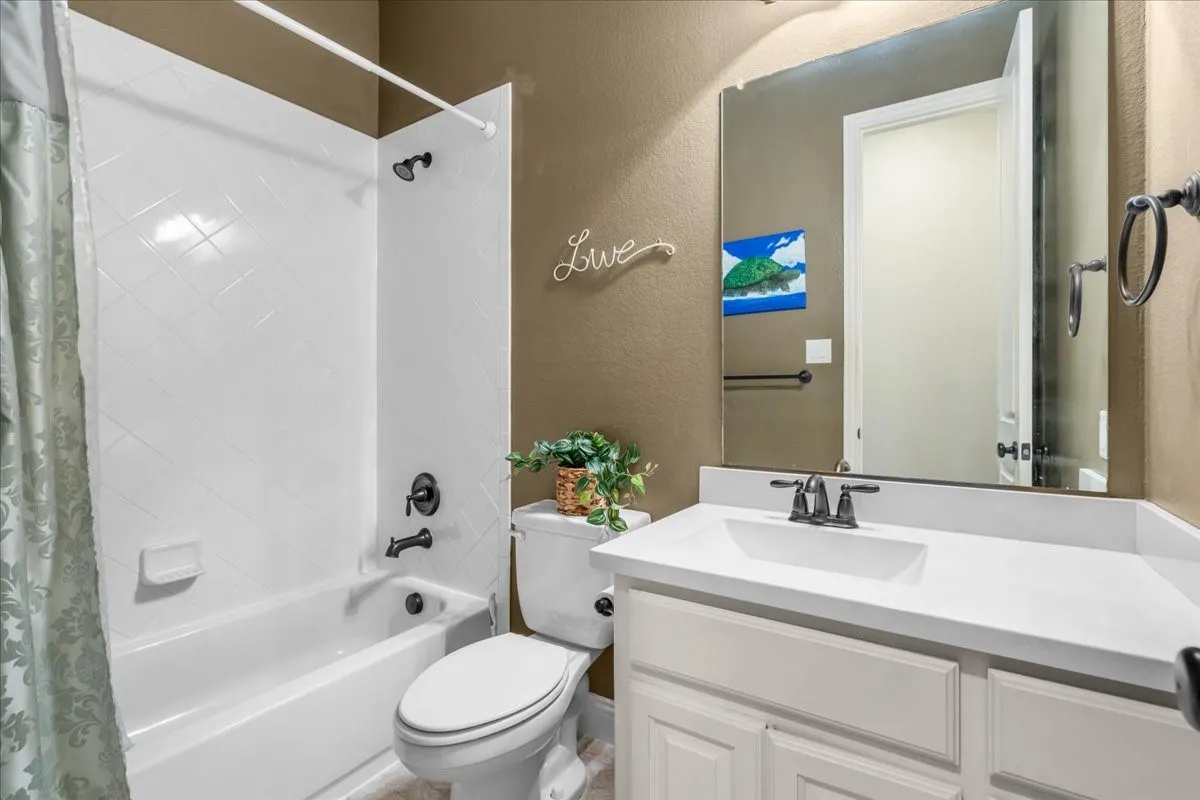 Guest full bathroom on first level.