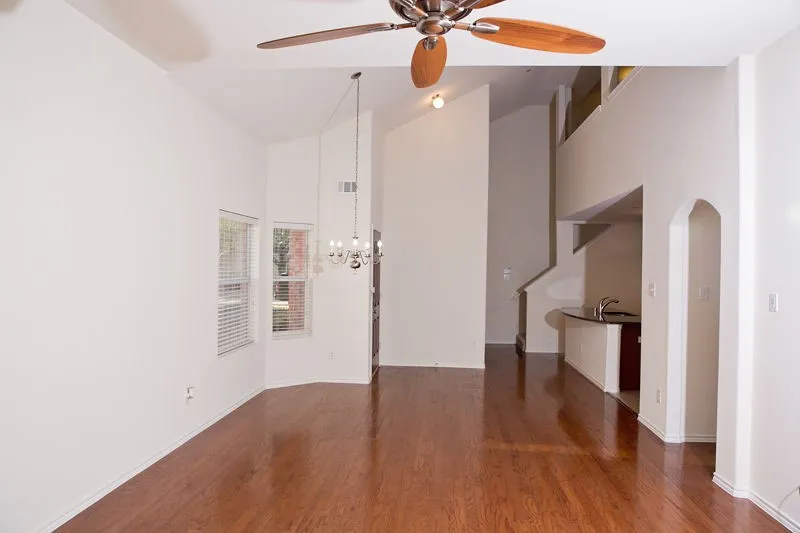 Large family room with lot's of natural light coming in.