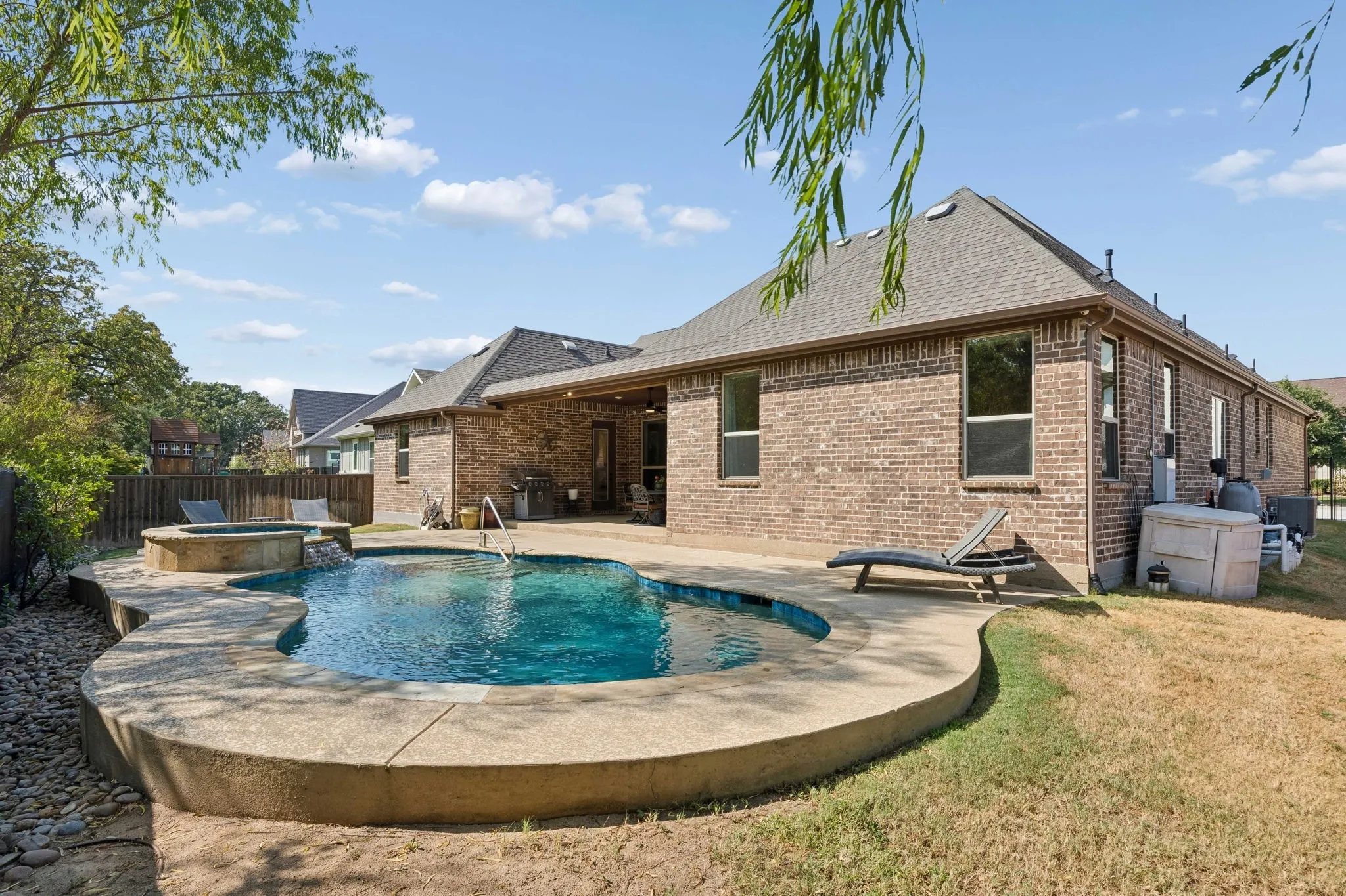 Elegantly designed pool with self cleaner- no hoses or pool cleaner to manage.