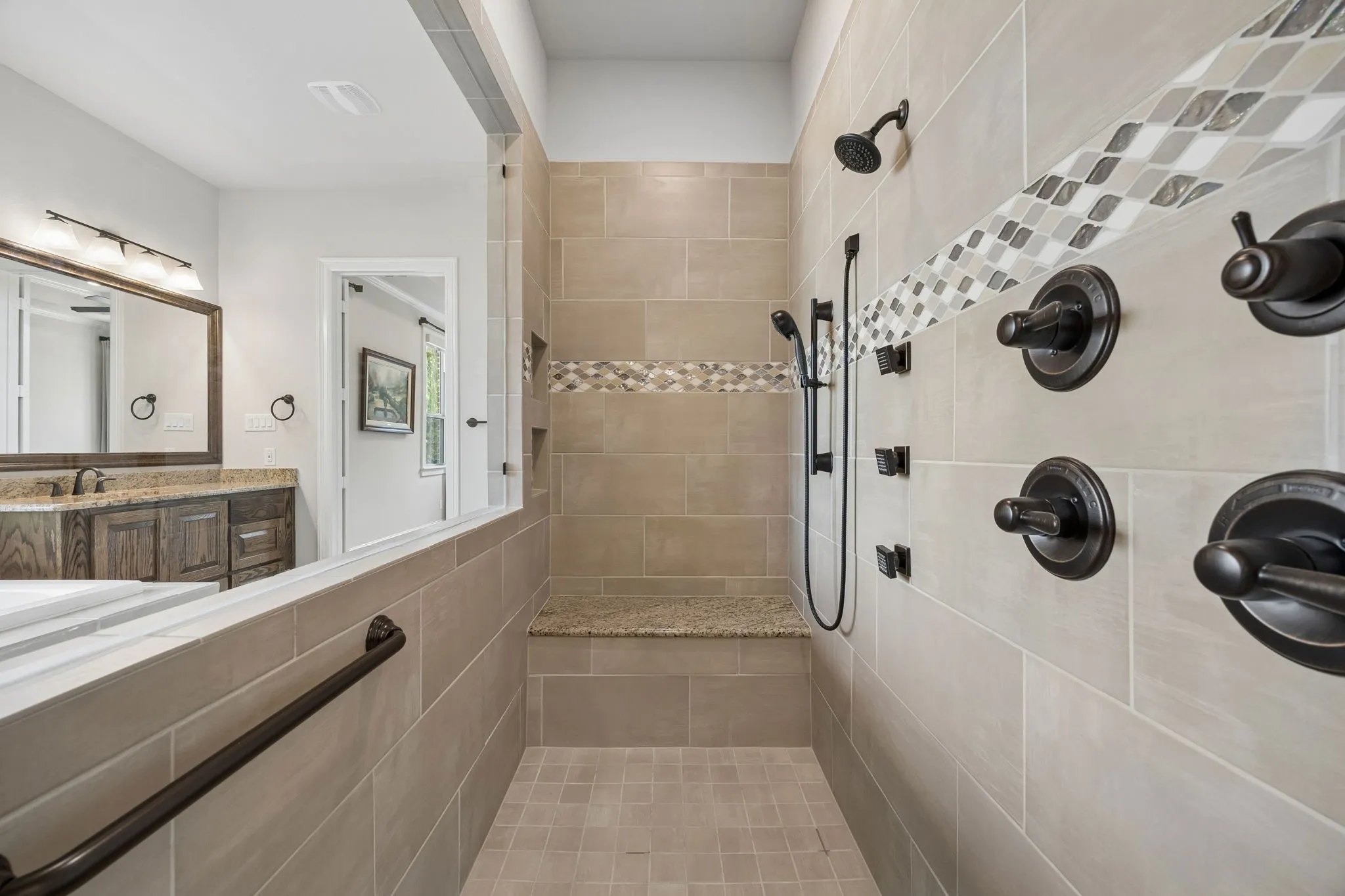 Oversized shower with bench.