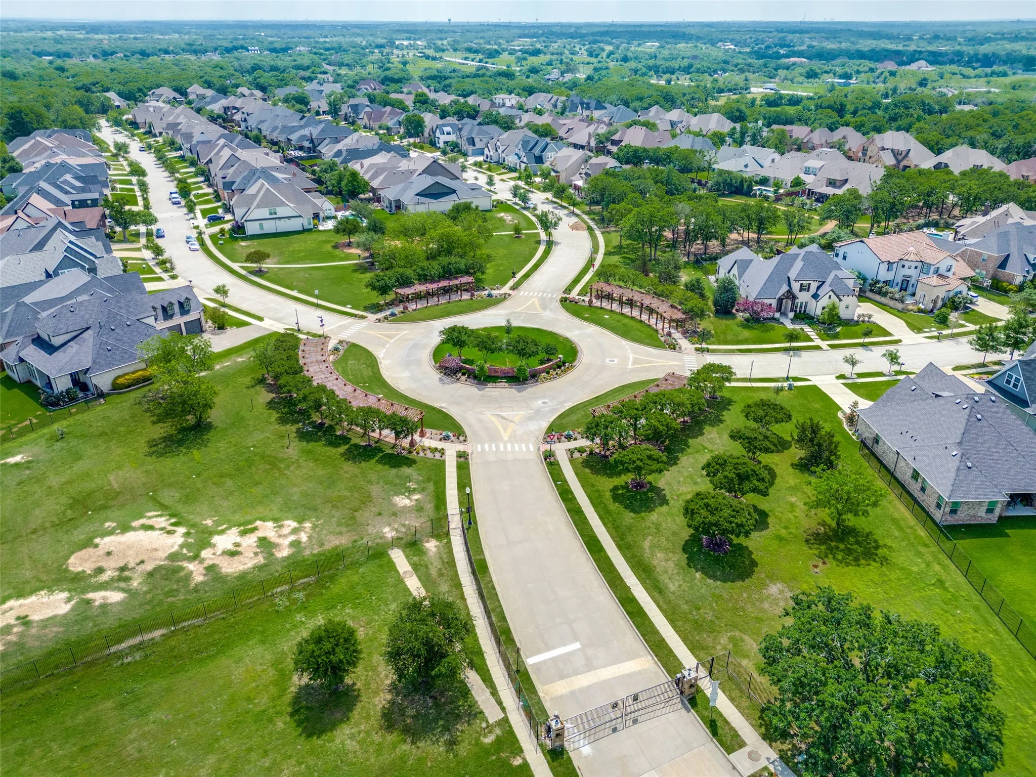 Partially gated neighborhood full of open space.