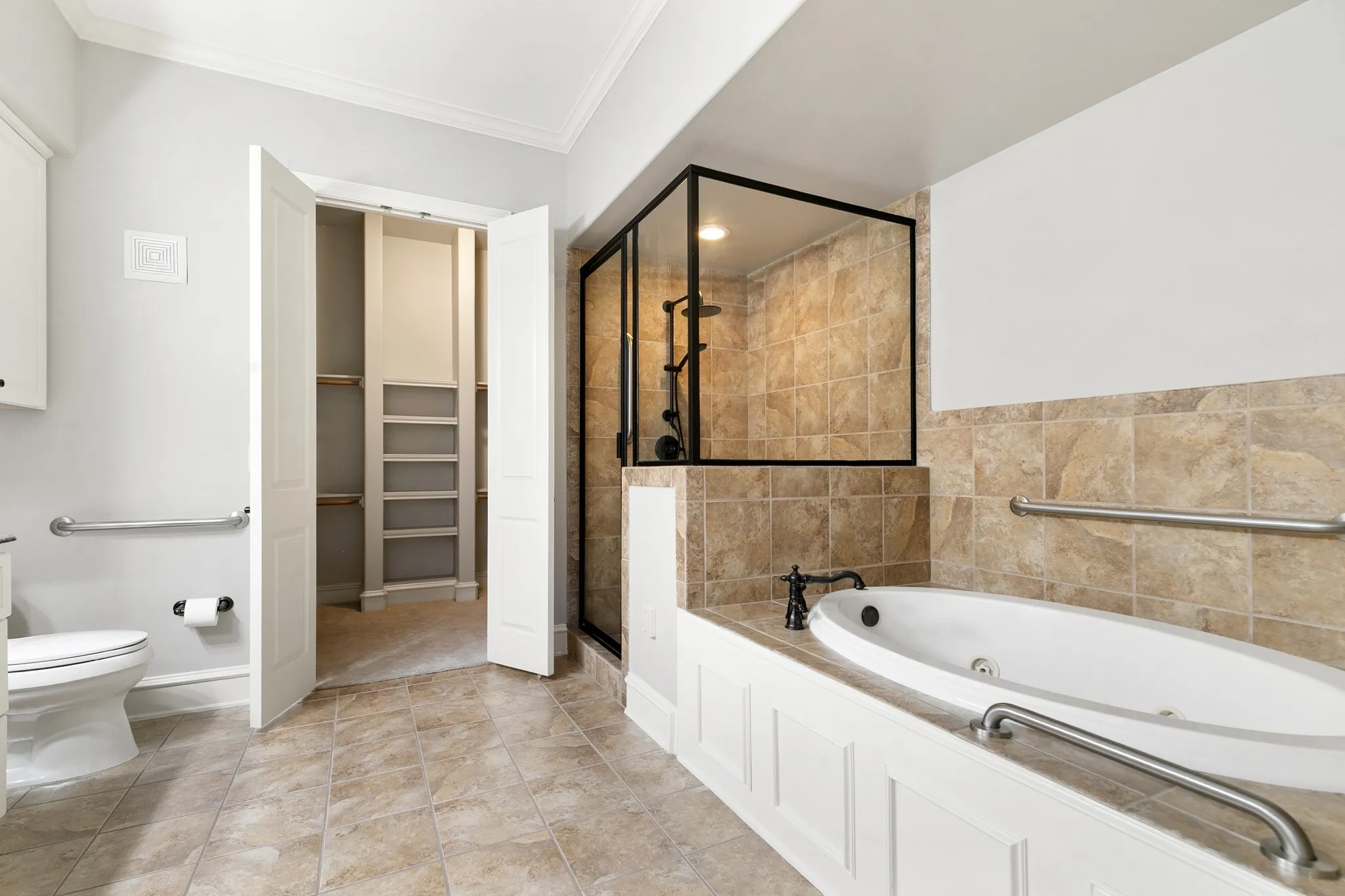 Tile flooring with a walk-in shower and separate soaking tub