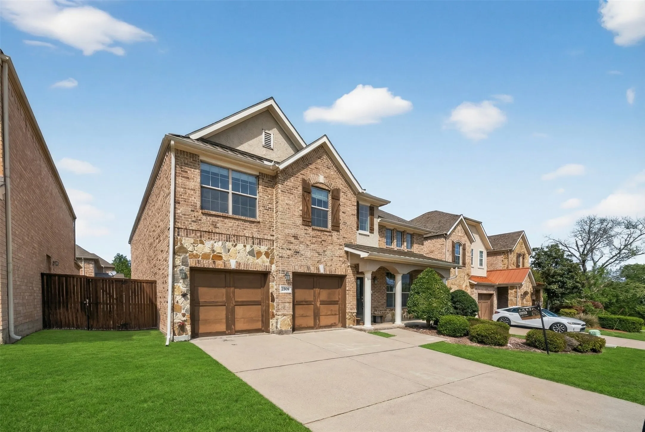 Brick and stone exterior with gabled roof lines