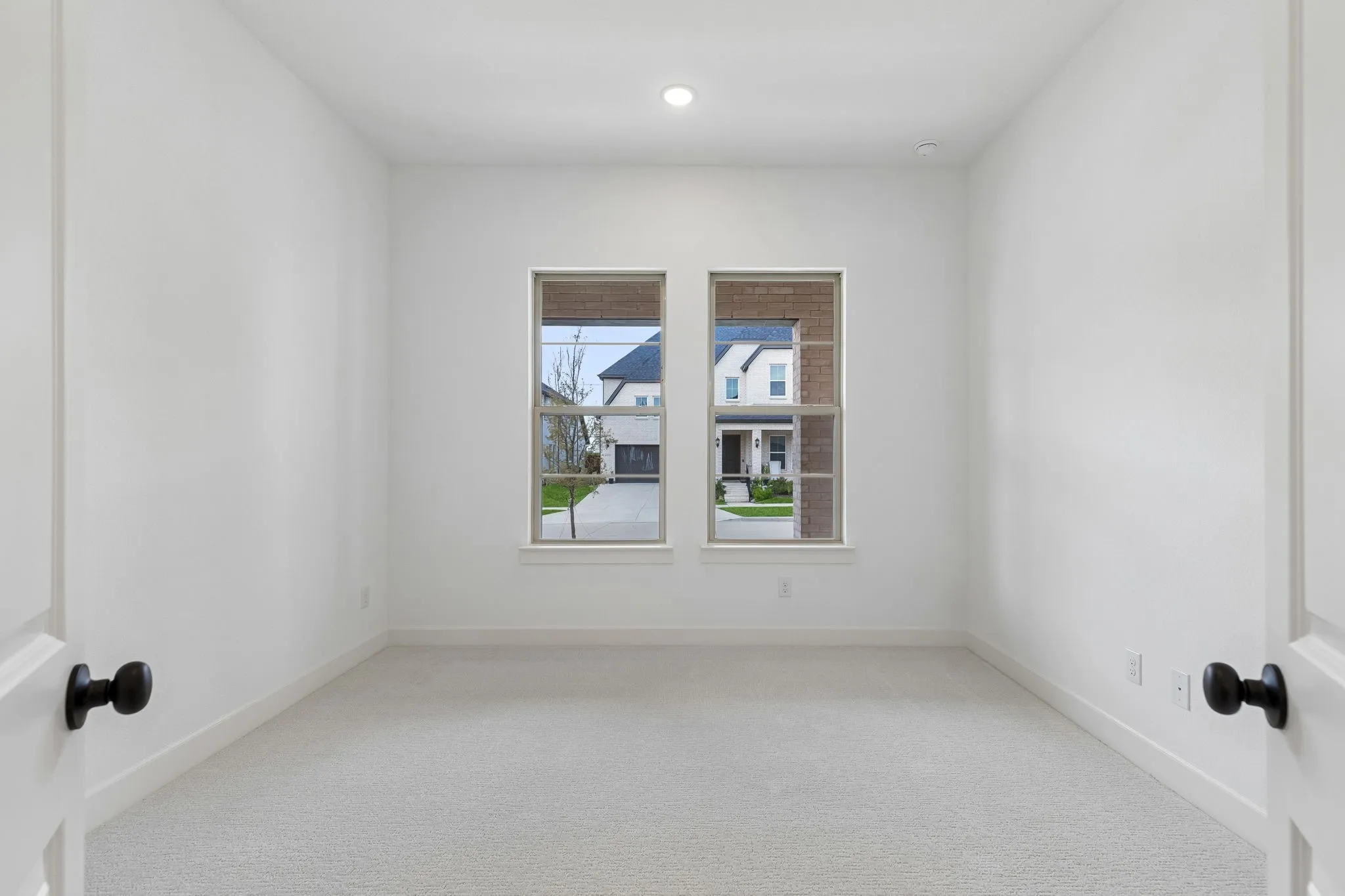 Light, bright an airy, this home office was designed for work or play!