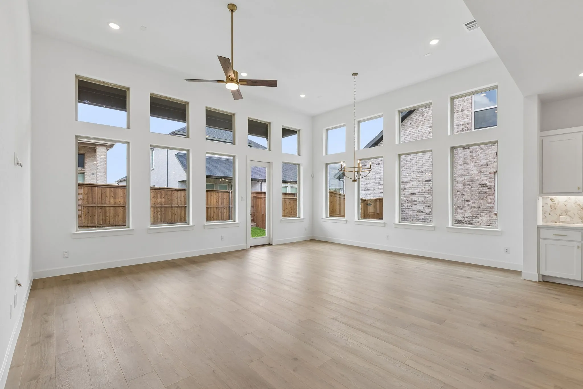 The breakfast nook paired with the family room create a cozy, light filled space for your family to enjoy.