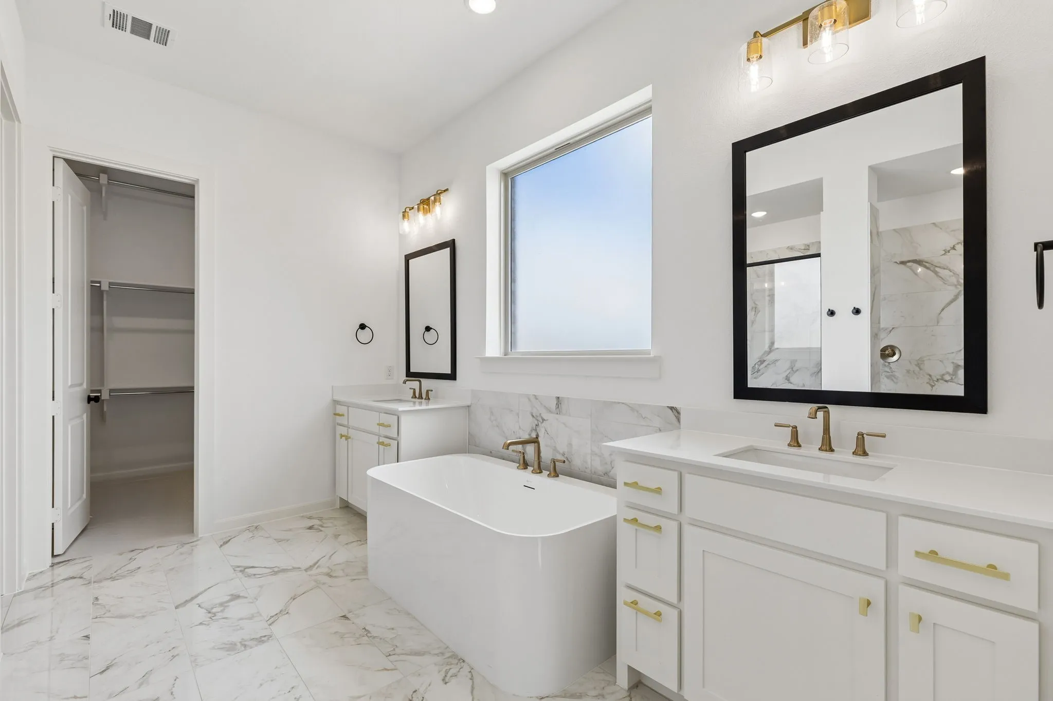 An owner's bath fit for a king and a queen!