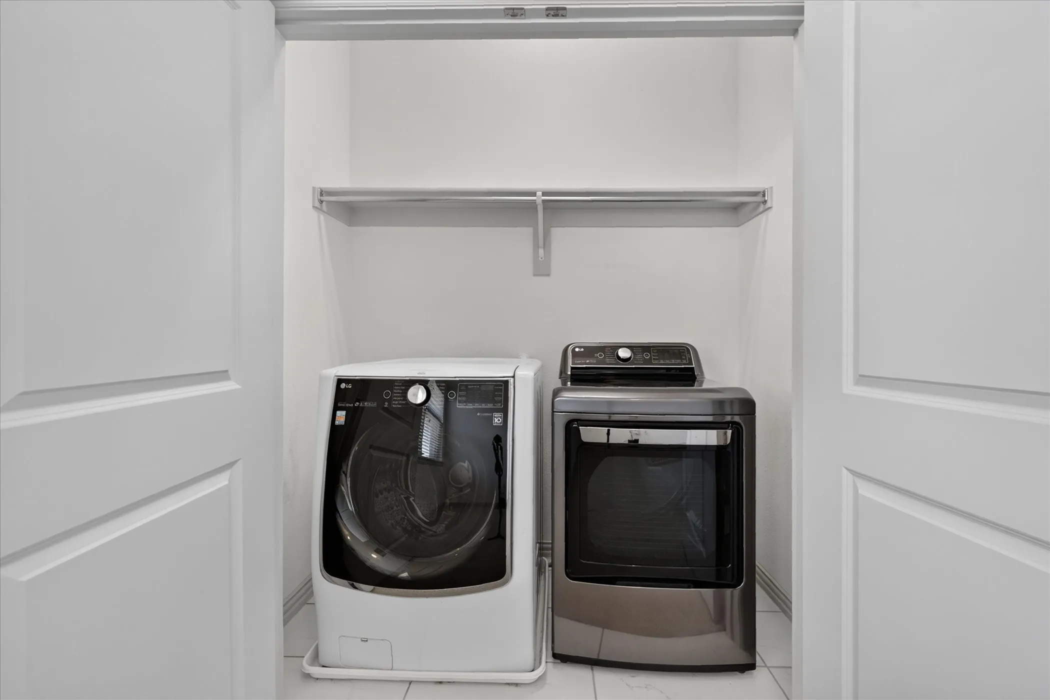 Laundry closet with built-in shelving