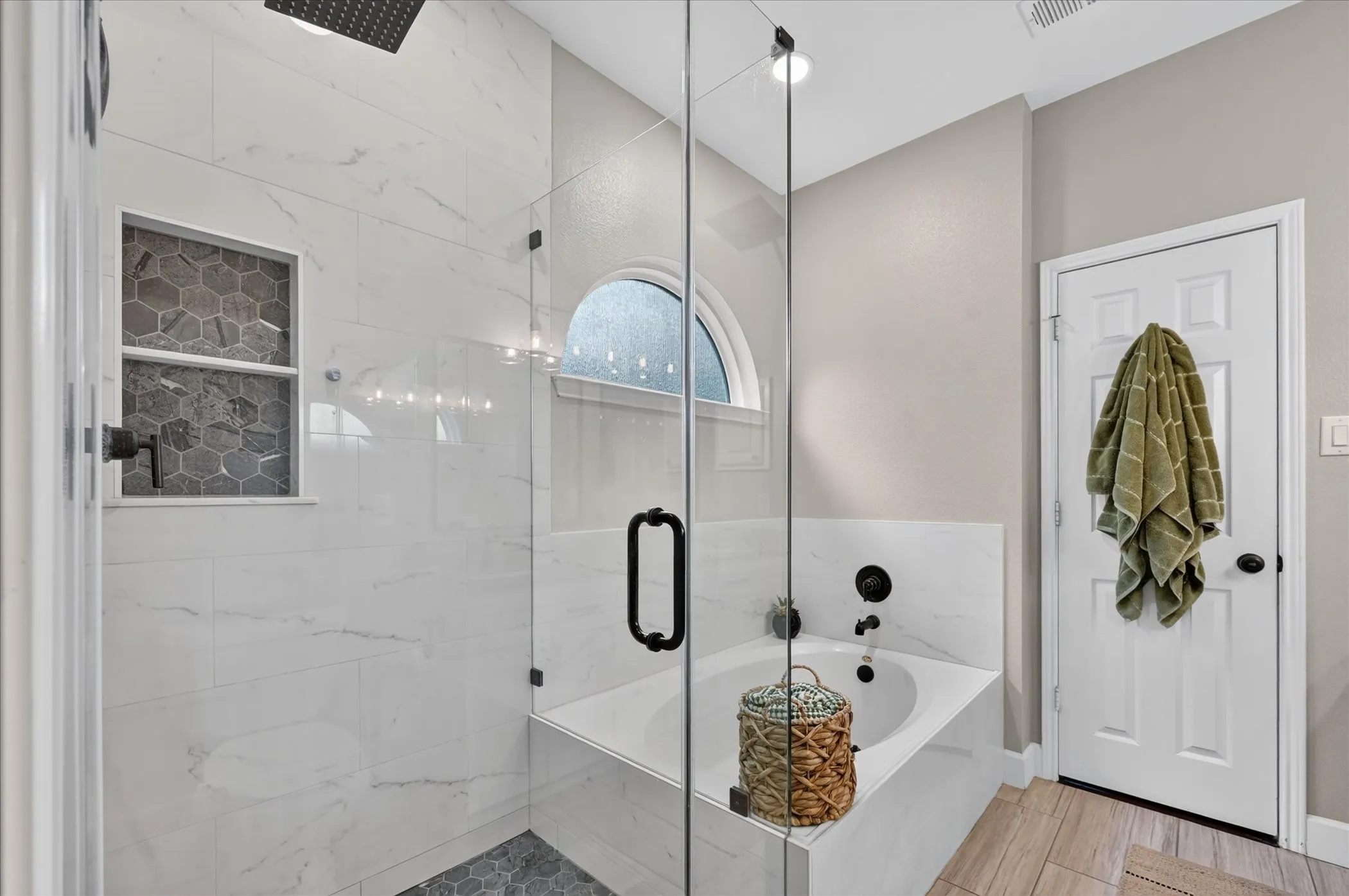 Remodeled walk-in shower plus new tile around tub